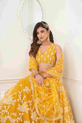 Lehenga Choli en filet brodé à paillettes jaune moutarde
