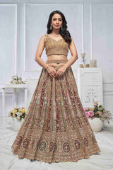 Lehenga Choli brodé en filet doux moutarde