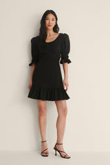Robe fendue avec lien dans le dos