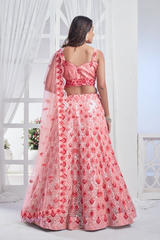 Peach Net Sequins Embroidered Lehenga Choli