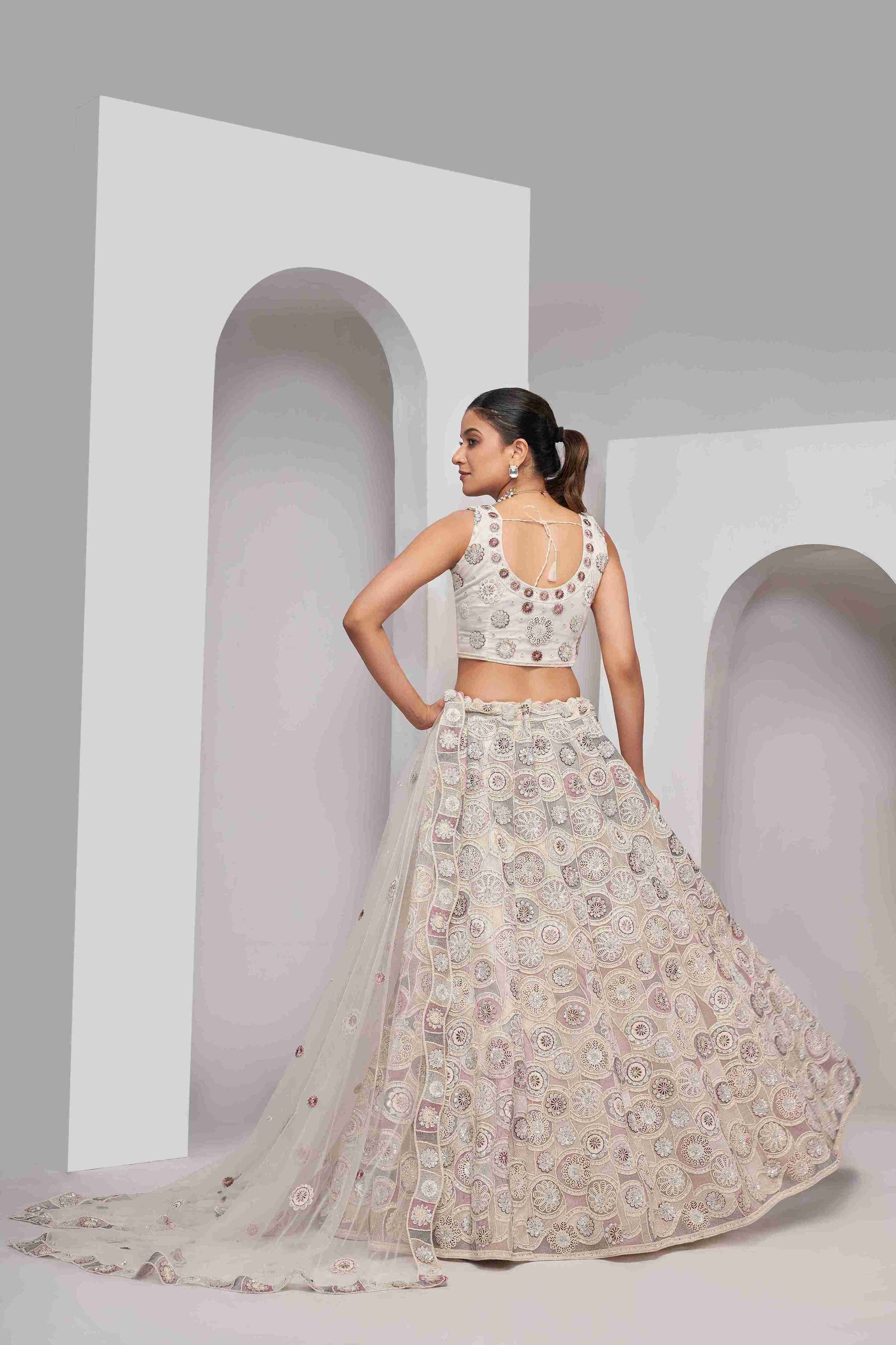 Ivory Net Sequins Lehenga Choli