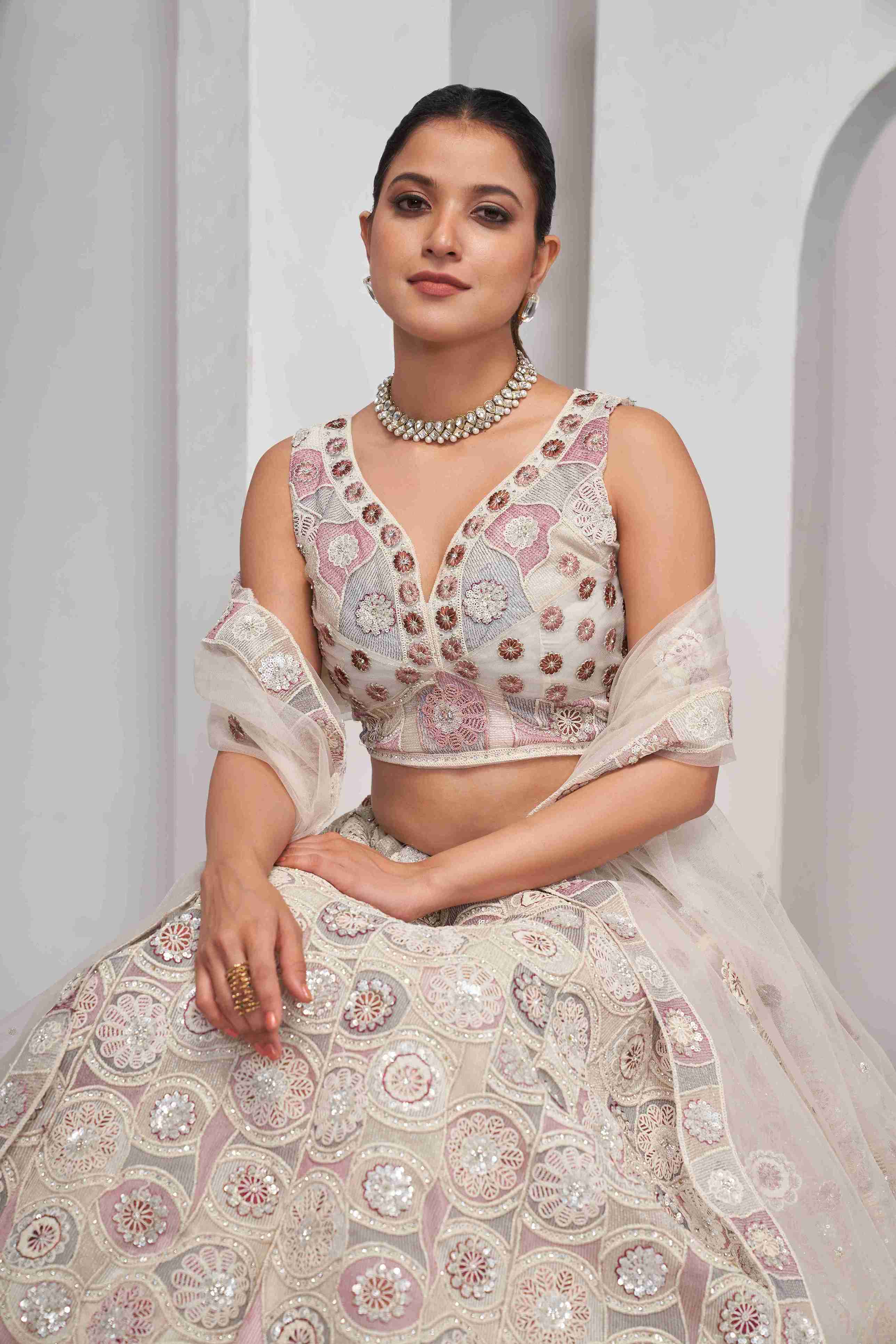 Ivory Net Sequins Lehenga Choli