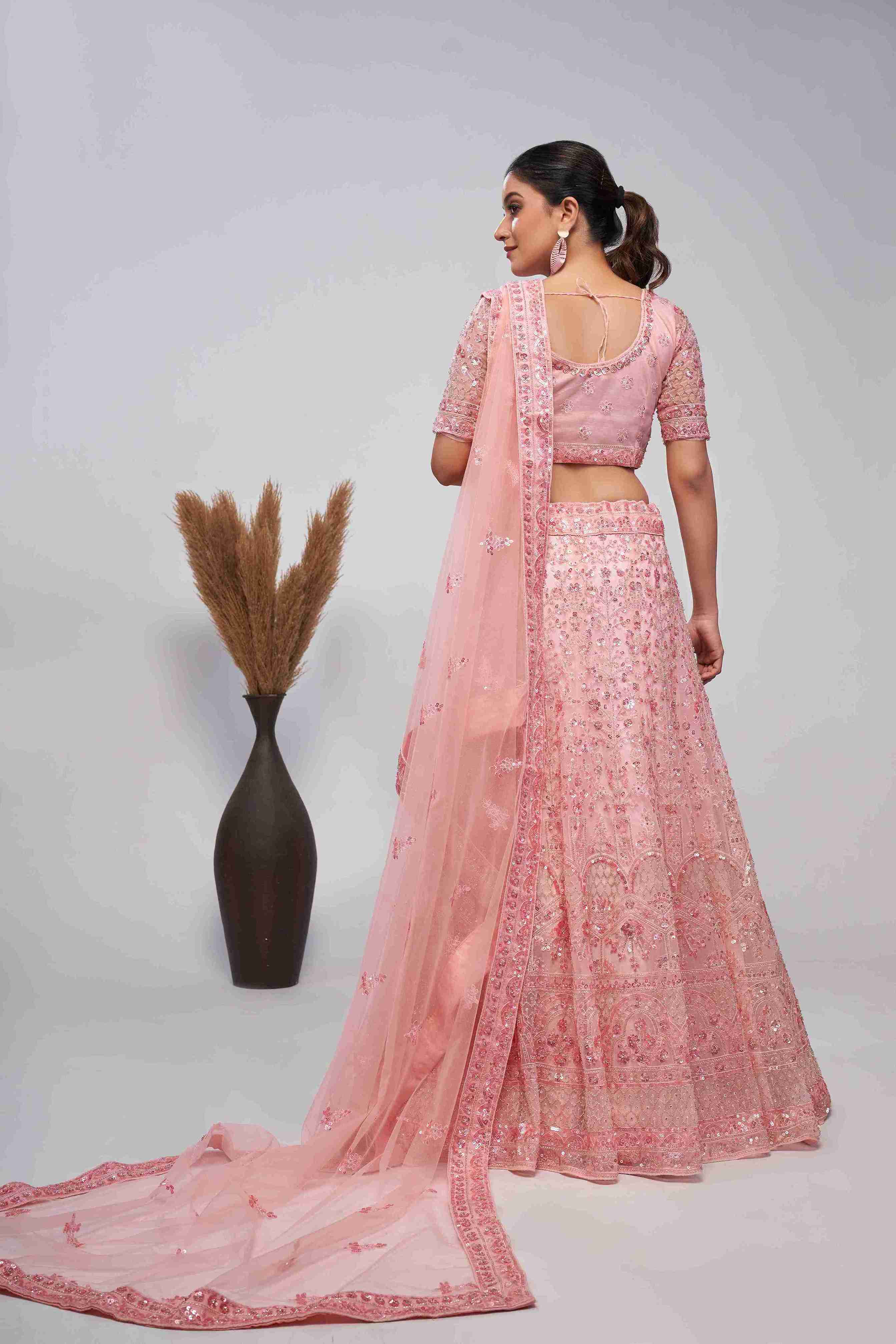 Pink Net Sequins Embroidered Lehenga Choli