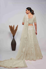 Ivory Net Sequins Cut Dana Work Lehenga Choli