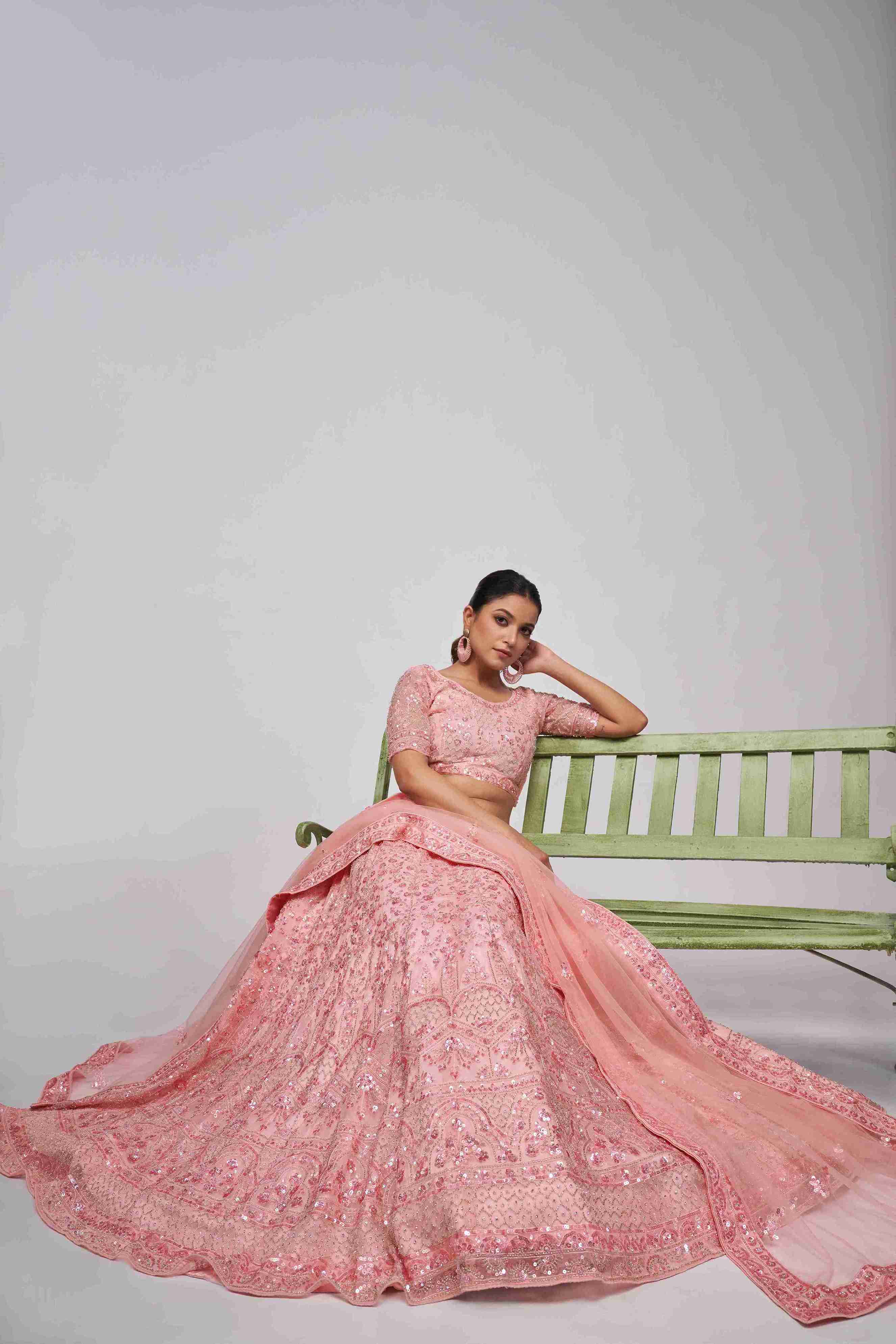 Pink Net Sequins Embroidered Lehenga Choli