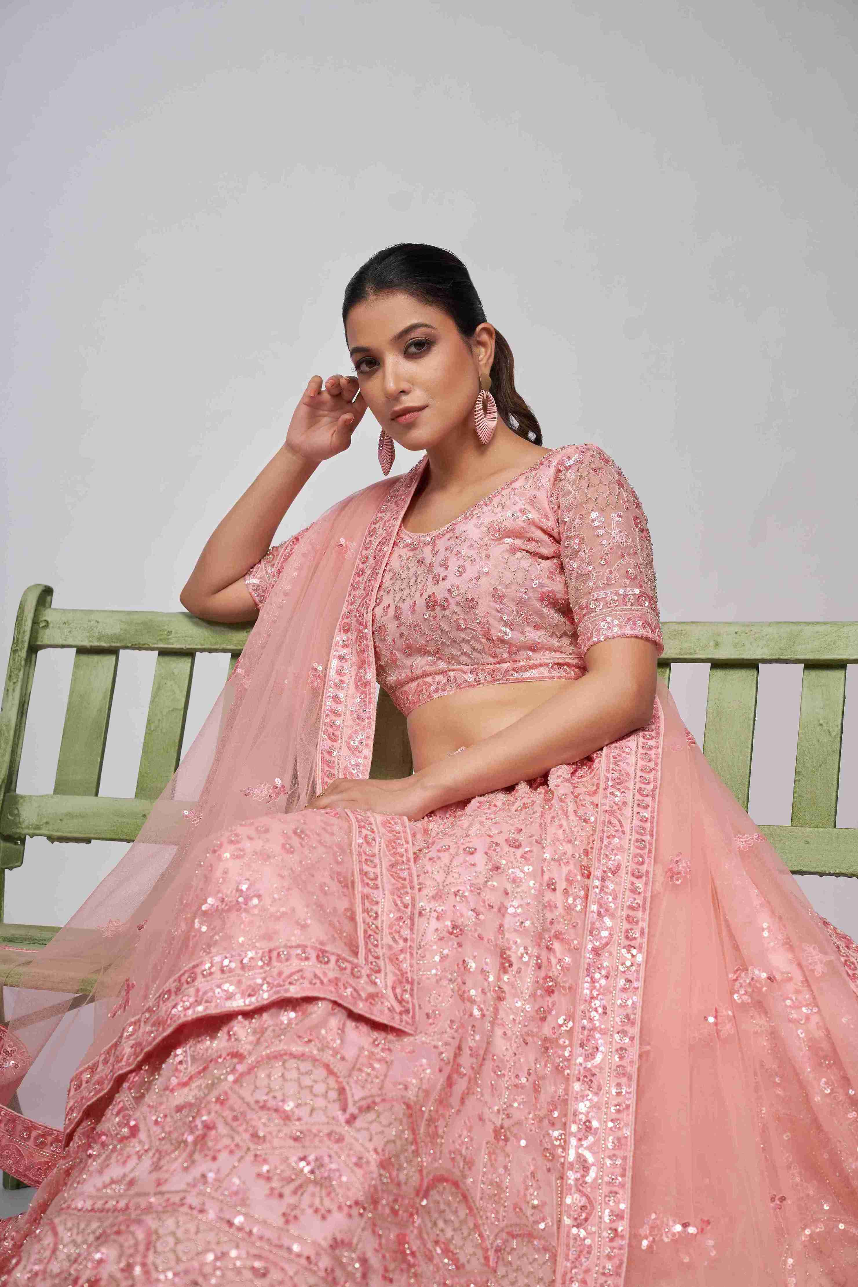 Pink Net Sequins Embroidered Lehenga Choli