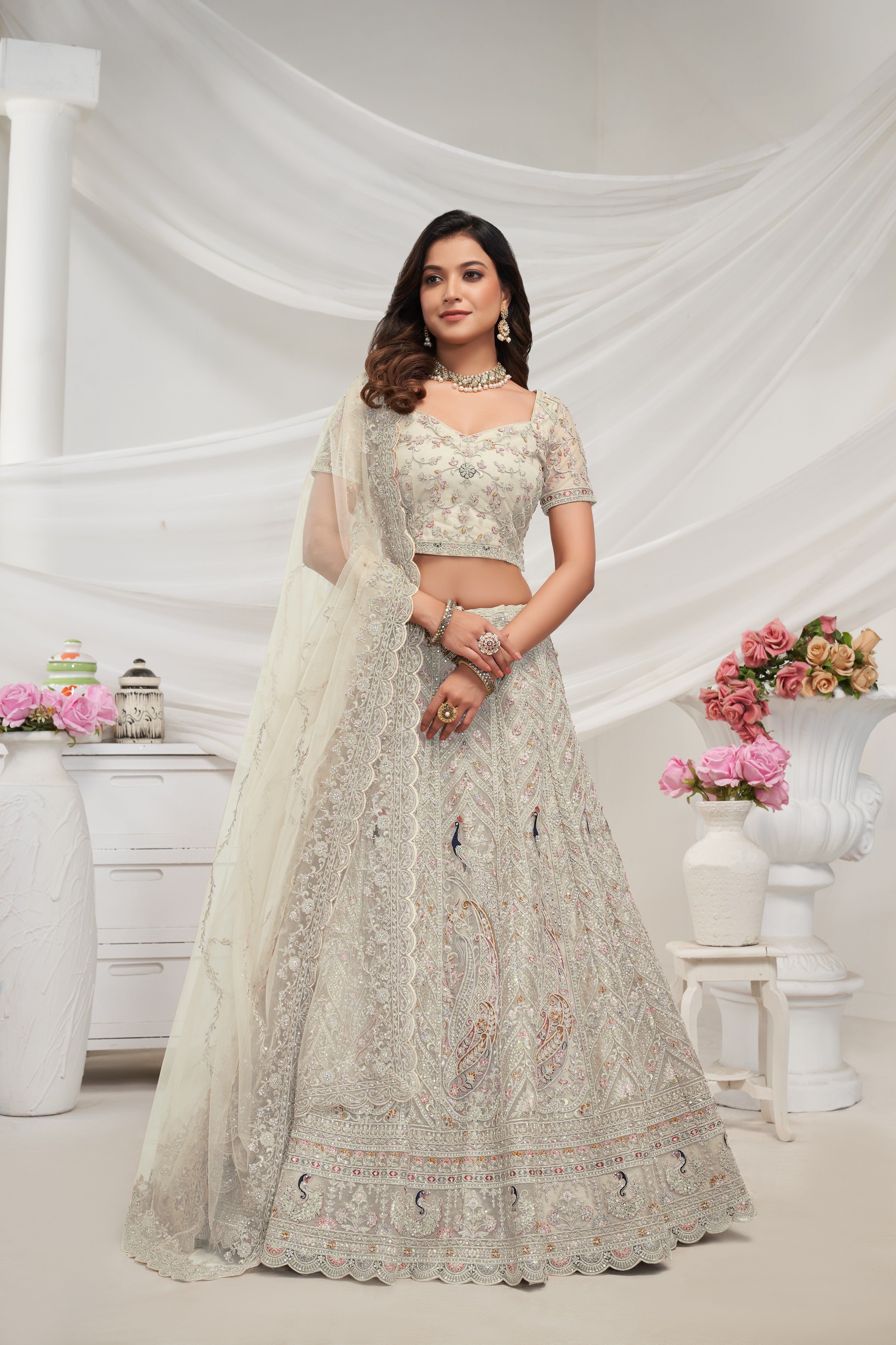 Off White Net Thread Embroidered Lehenga Choli