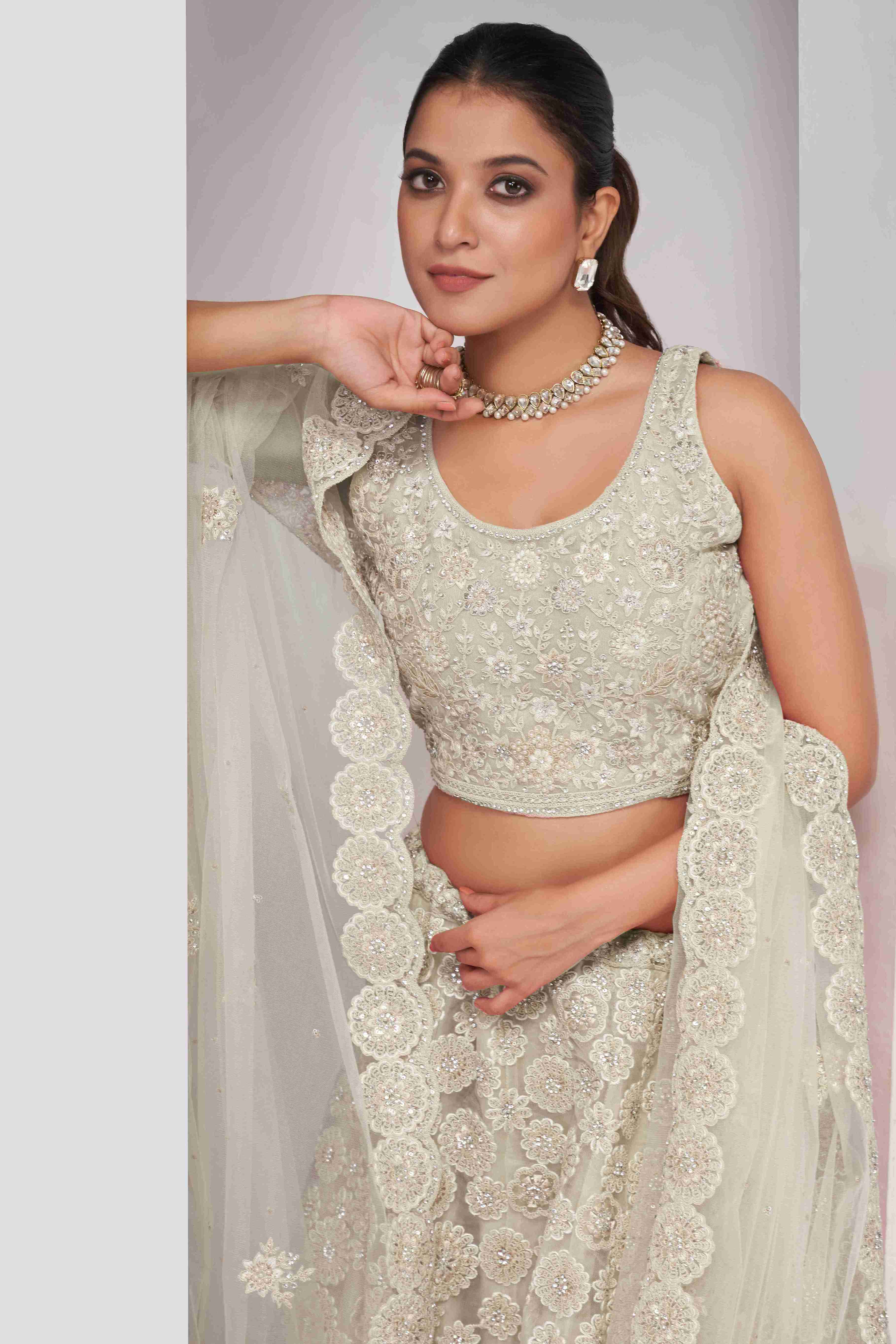 Ivory Net Thread Embroidered Lehenga Choli