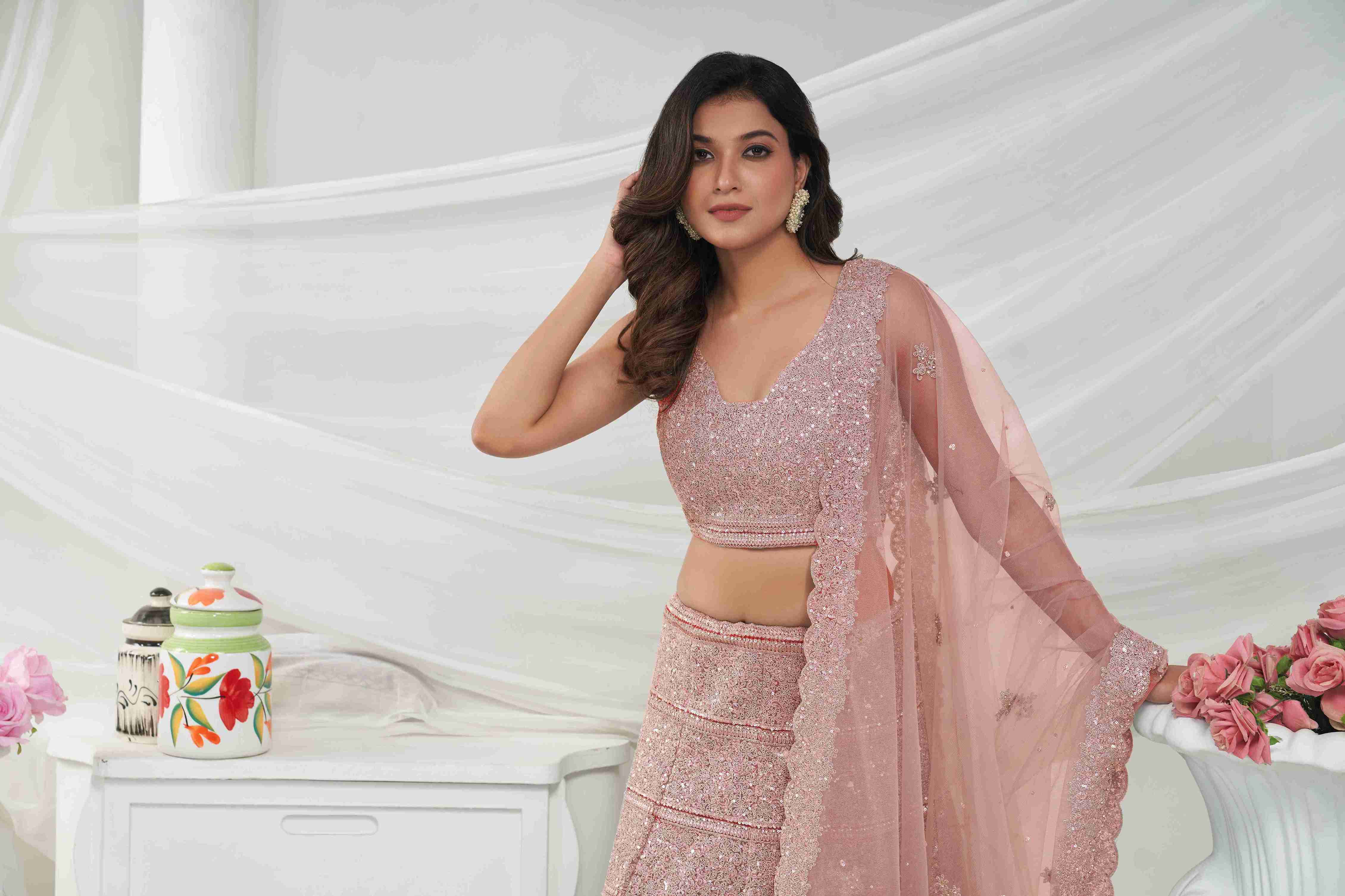 Pink Net Diwali Special A Line Lehenga With Embroidery And Sequins Wedding Wear