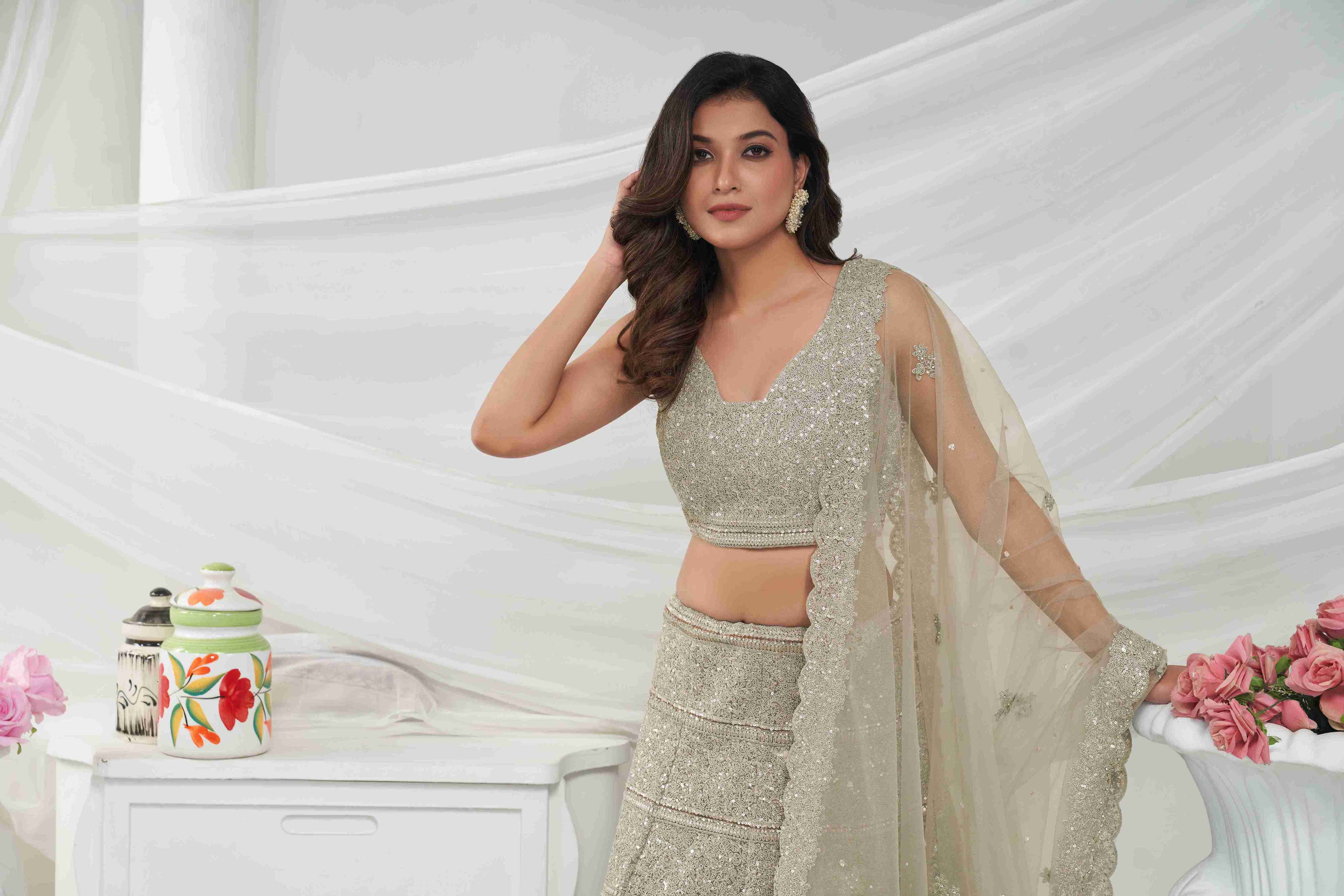 Silver Net Diwali Special A Line Lehenga With Embroidery And Sequins Wedding Wear