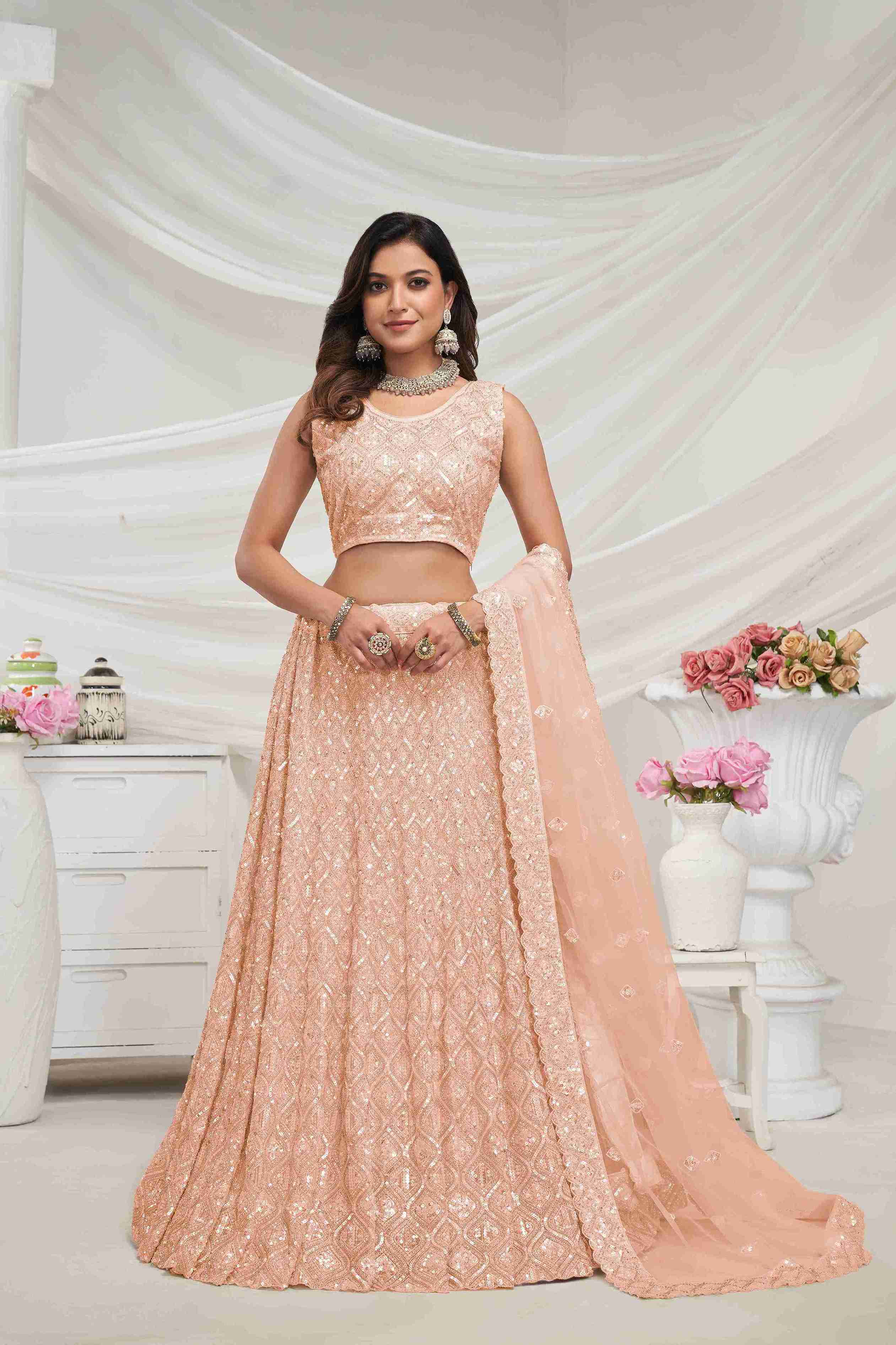 Peach Net Diwali Special A Line Lehenga With Embroidery And Sequins Wedding Wear