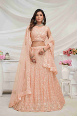 Peach Net Diwali Special A Line Lehenga With Embroidery And Sequins Wedding Wear