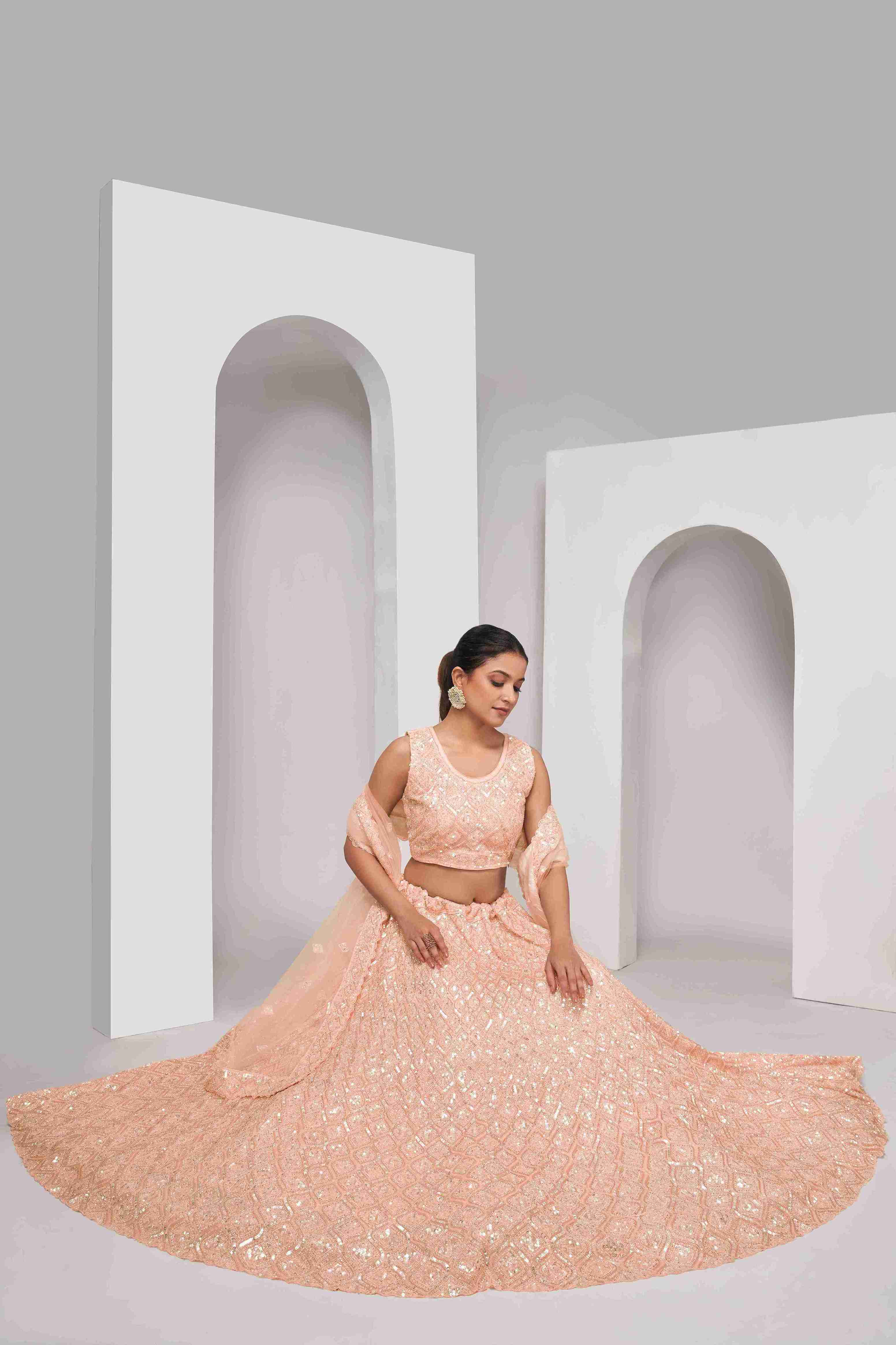 Peach Net Diwali Special A Line Lehenga With Embroidery And Sequins Wedding Wear