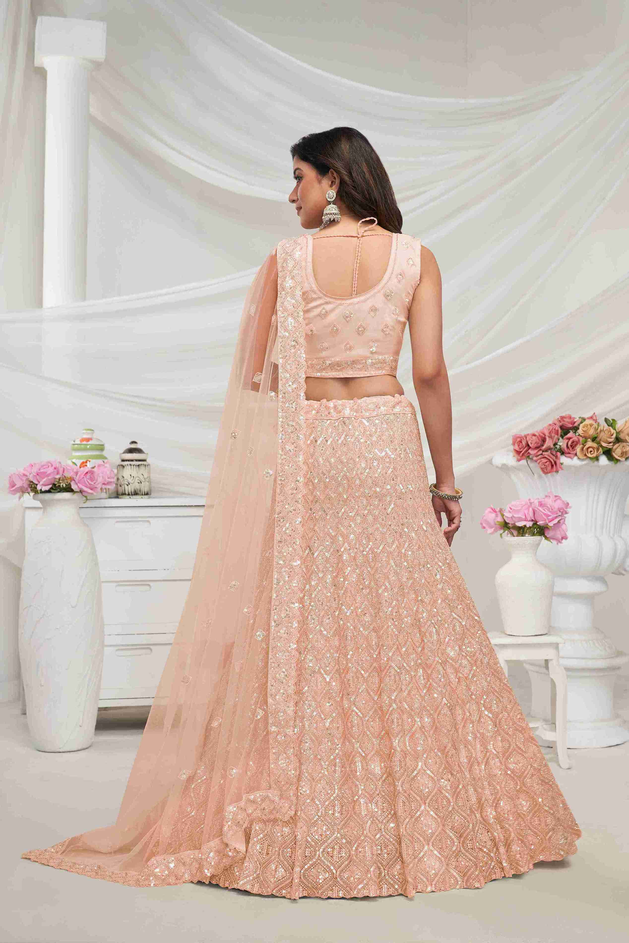 Peach Net Diwali Special A Line Lehenga With Embroidery And Sequins Wedding Wear