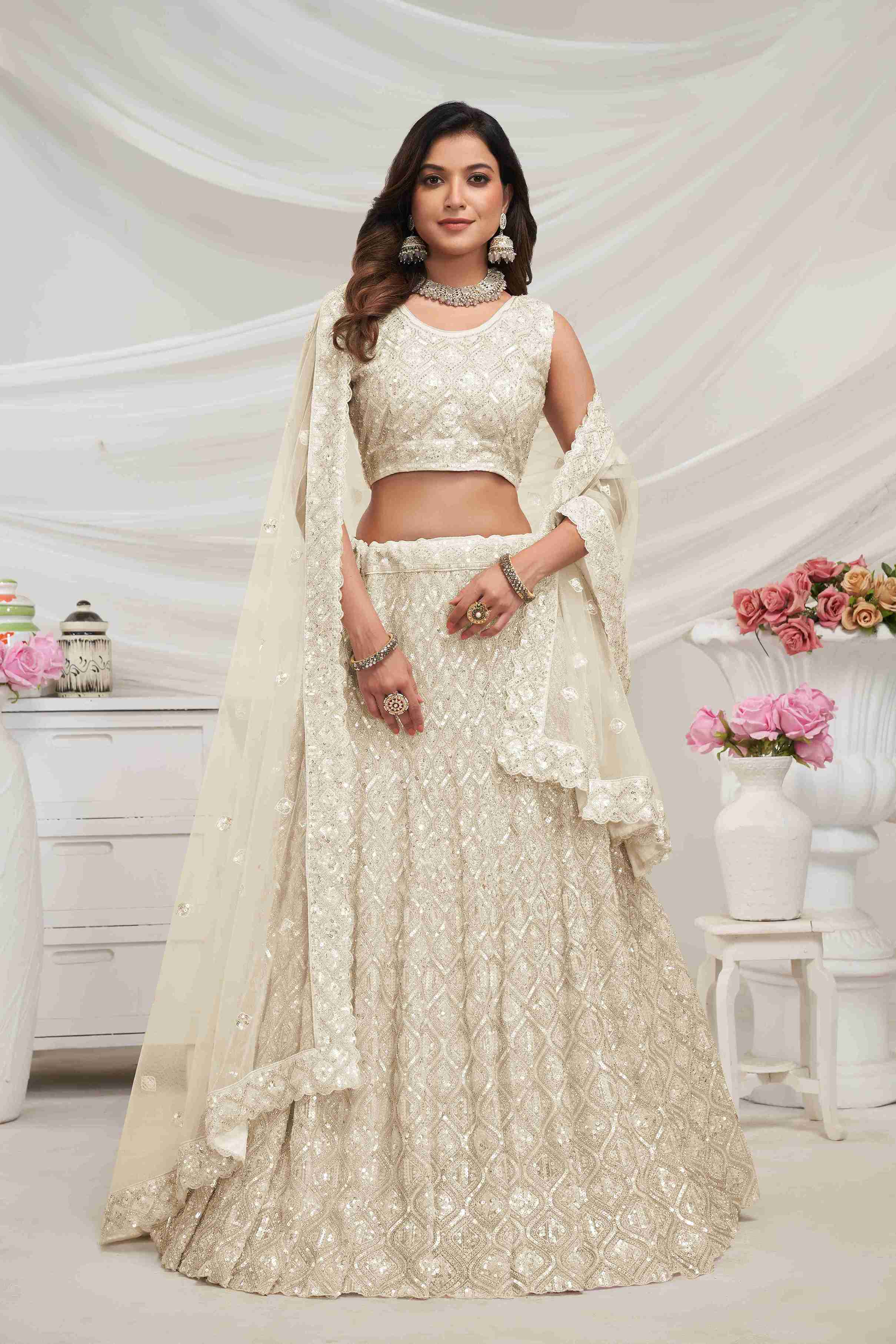 Ivory Net Diwali Special A Line Lehenga With Embroidery And Sequins Wedding Wear