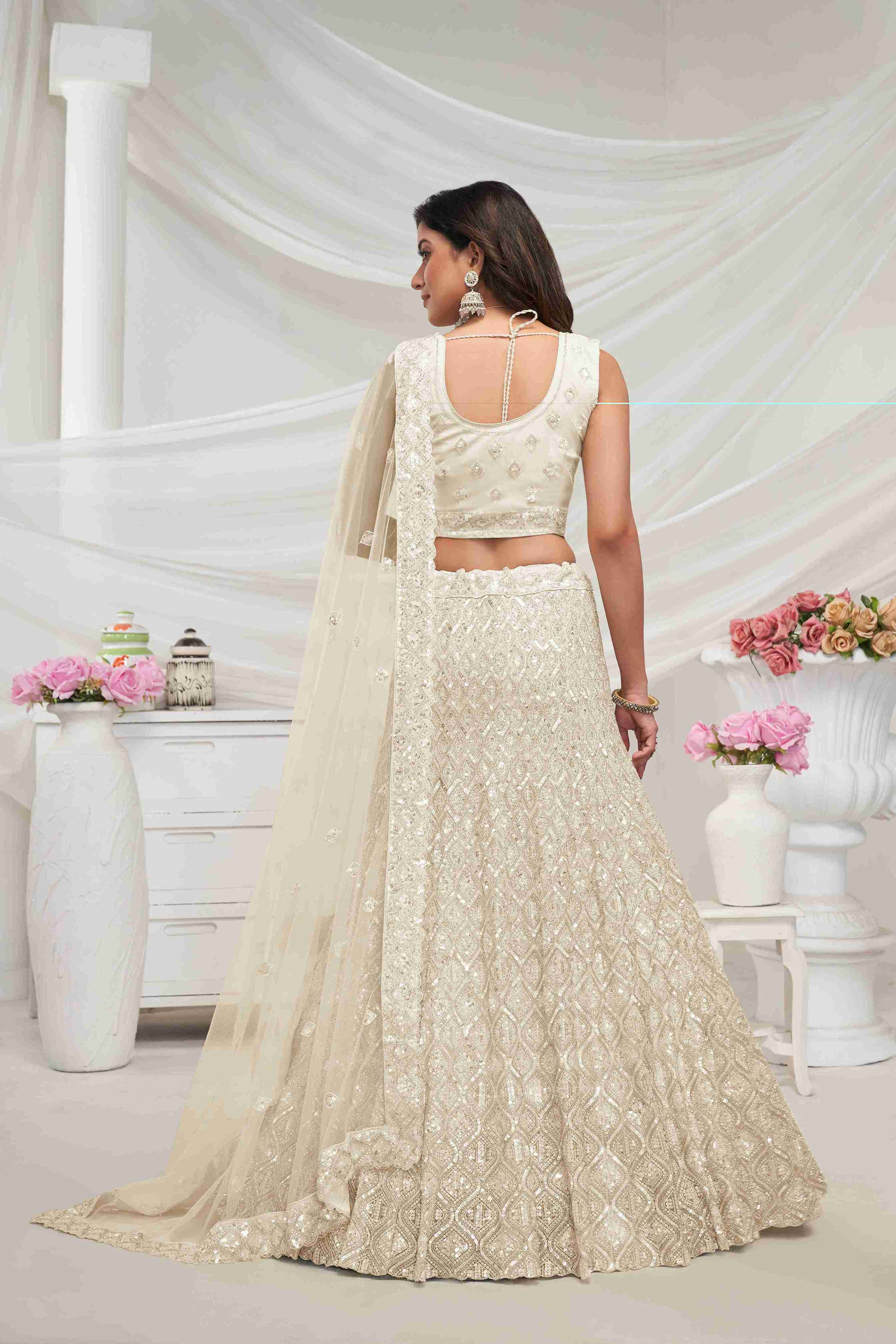 Ivory Net Diwali Special A Line Lehenga With Embroidery And Sequins Wedding Wear