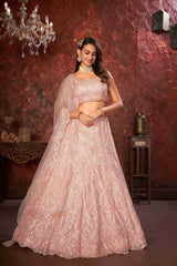 Peach Net Diwali Special A Line Lehenga With Embroidery And Sequins Wedding Wear