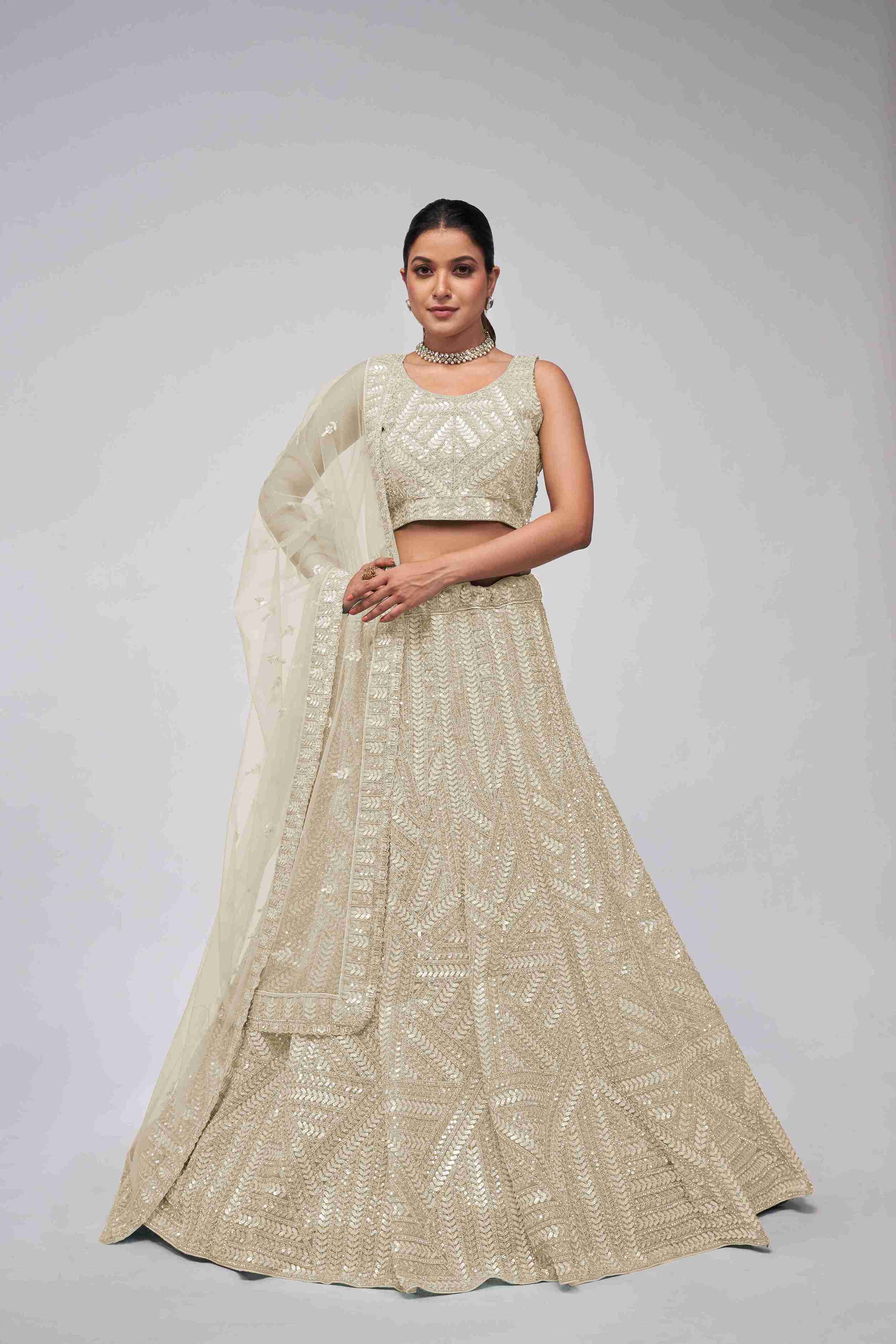 Ivory Net Diwali Special A Line Lehenga With Embroidery And Sequins Wedding Wear