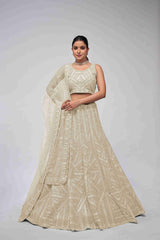 Ivory Net Diwali Special A Line Lehenga With Embroidery And Sequins Wedding Wear