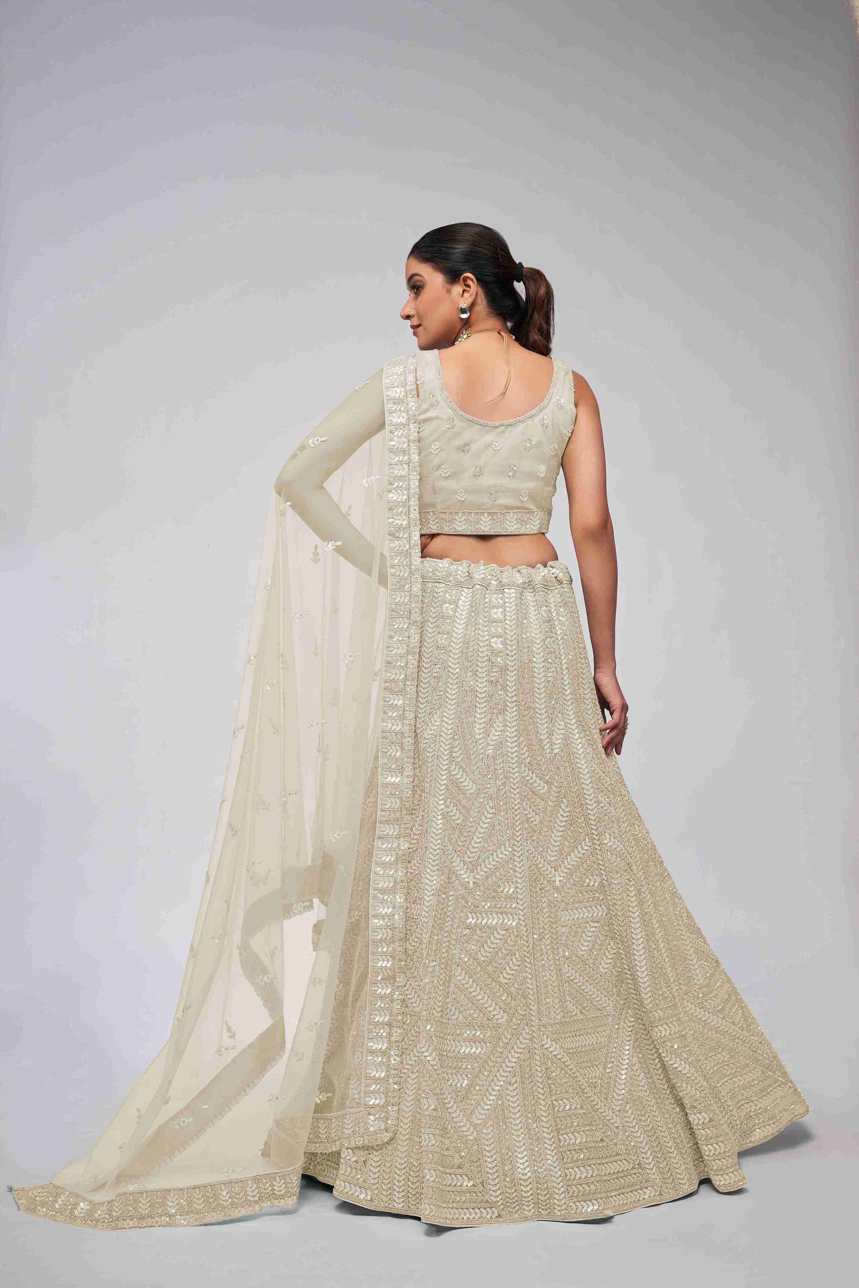 Ivory Net Diwali Special A Line Lehenga With Embroidery And Sequins Wedding Wear