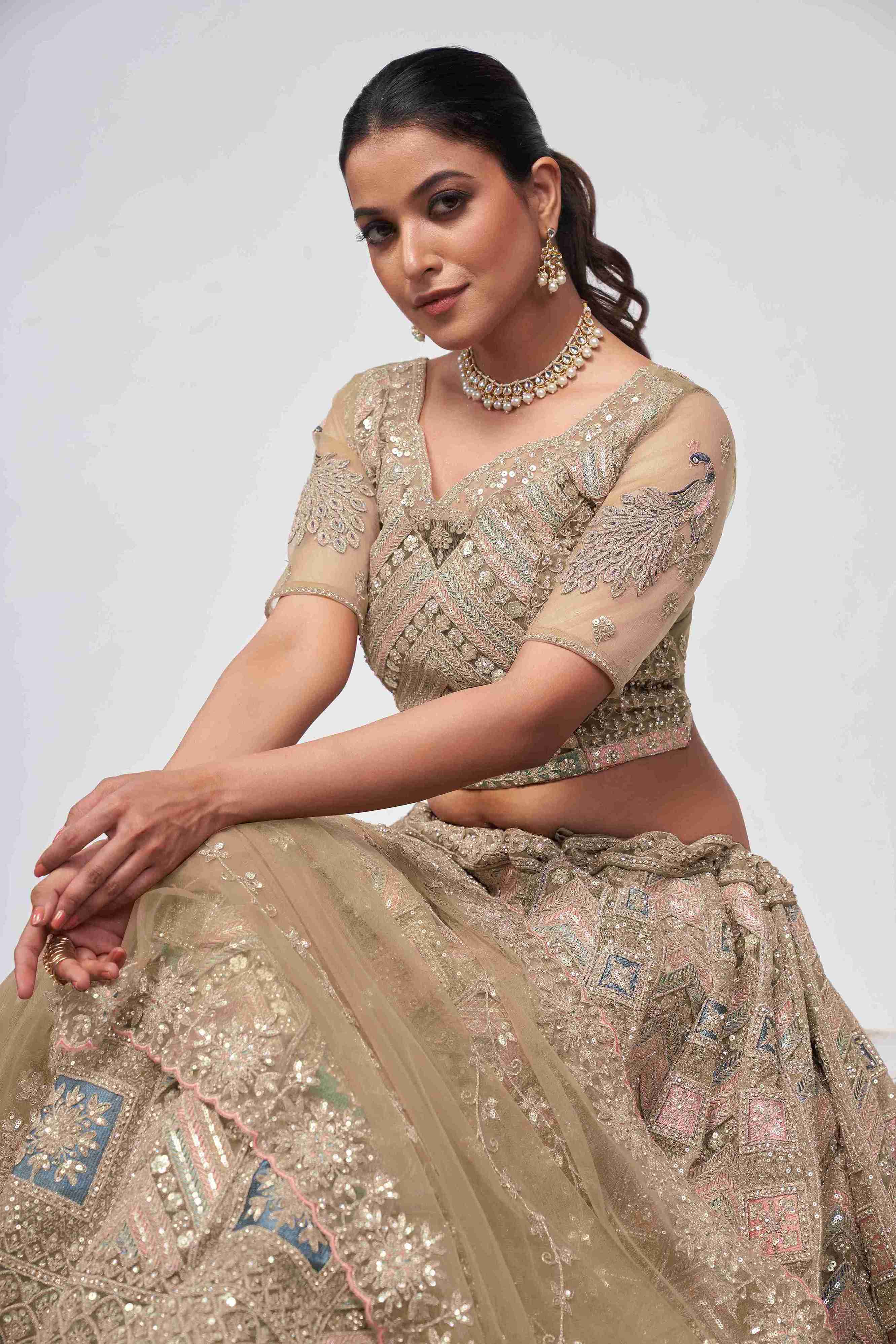 Golden Net Diwali Special A Line Lehenga With Embroidery And Sequins Wedding Wear