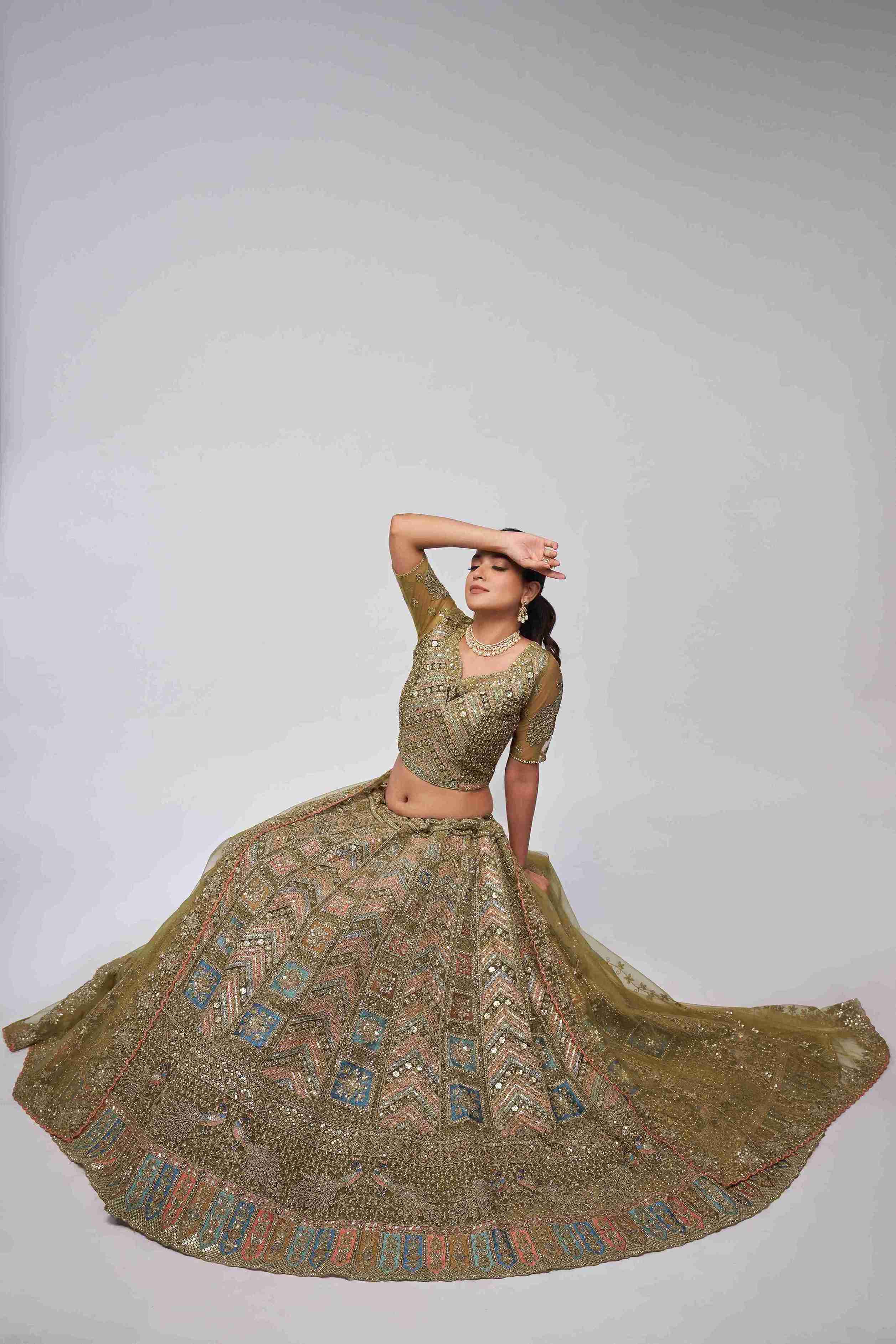 Olive Green Net Diwali Special A Line Lehenga With Embroidery And Sequins Wedding Wear