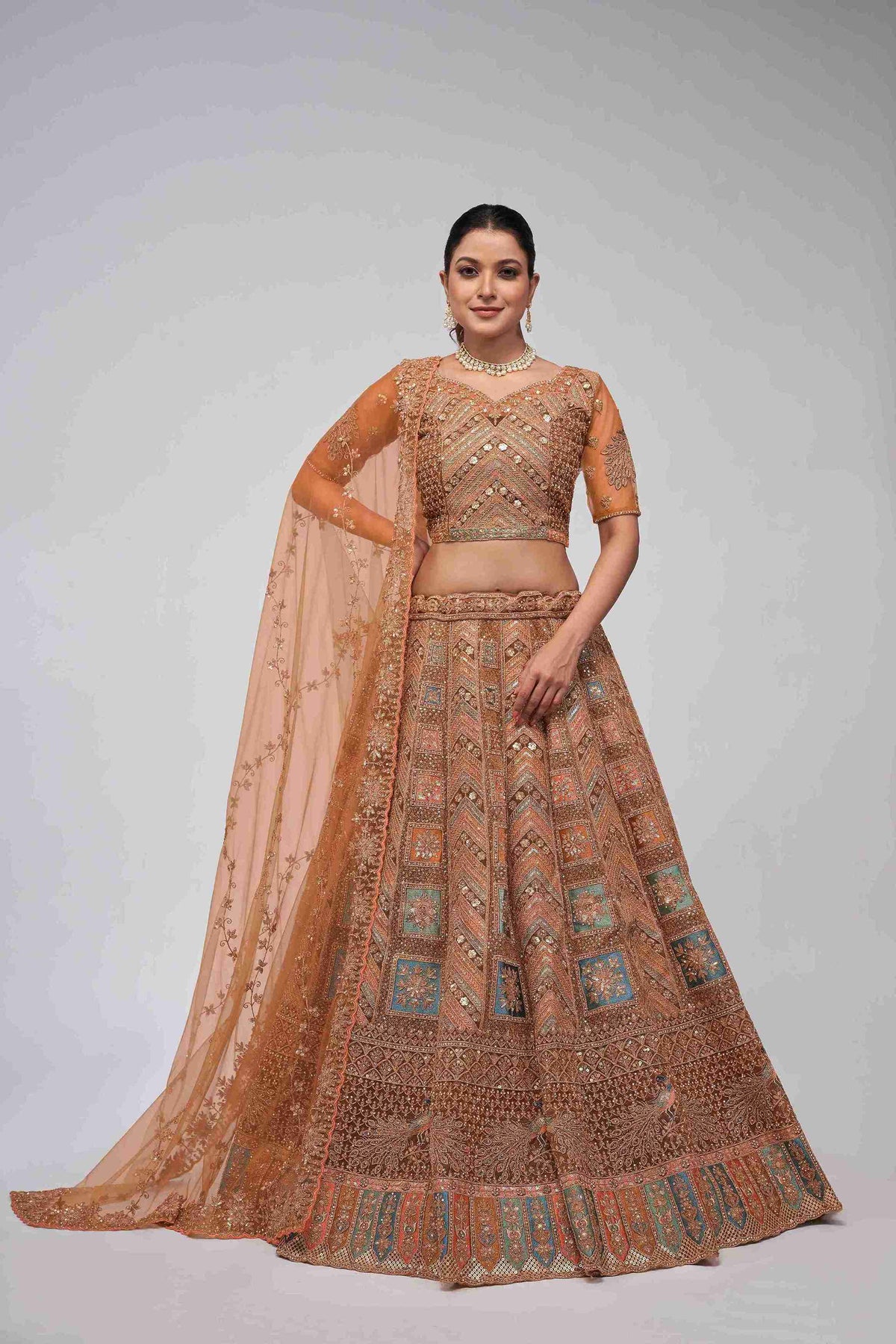 Rust Orange Net Diwali Special A Line Lehenga With Embroidery And Sequins Wedding Wear