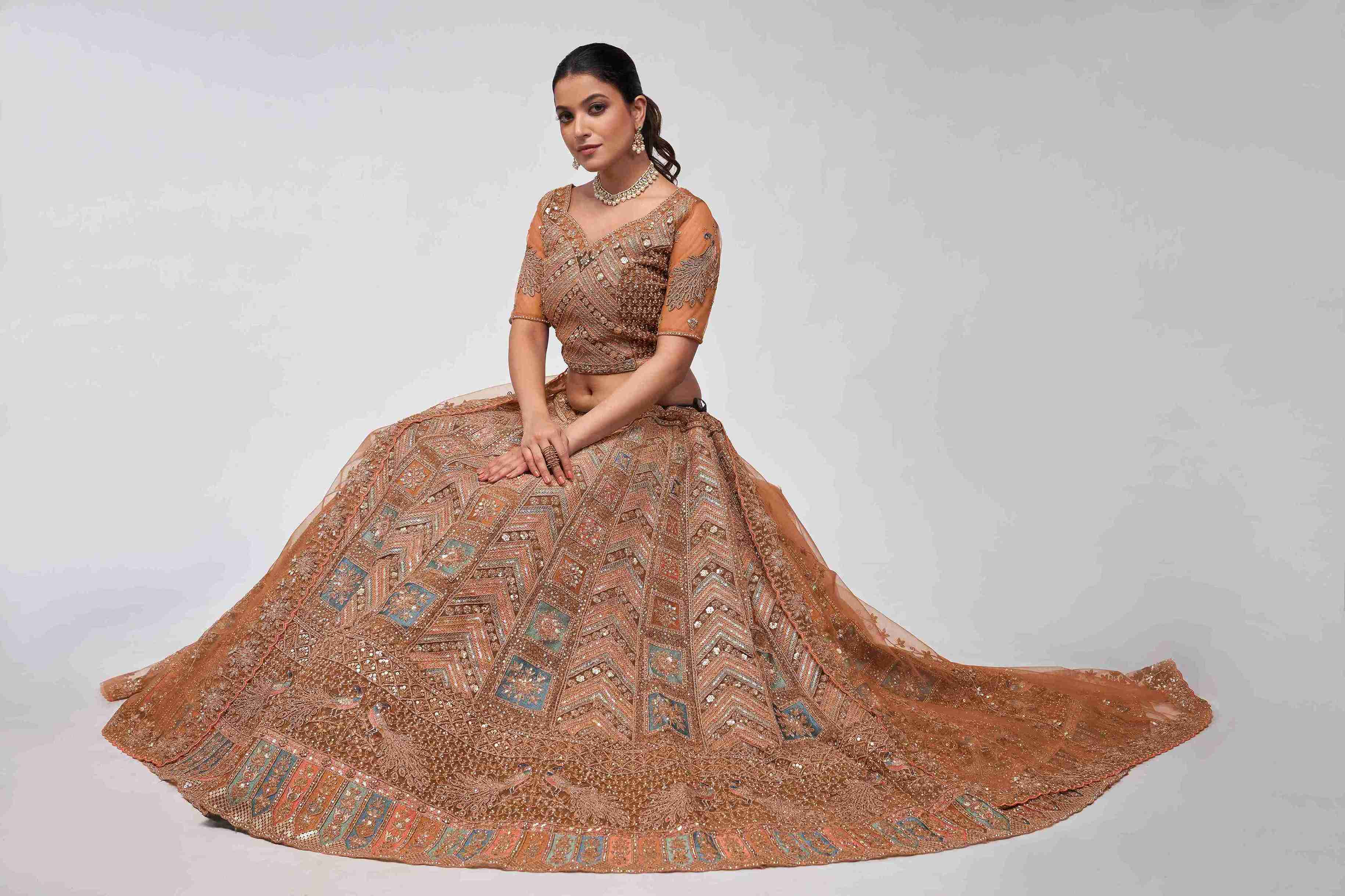 Rust Orange Net Diwali Special A Line Lehenga With Embroidery And Sequins Wedding Wear