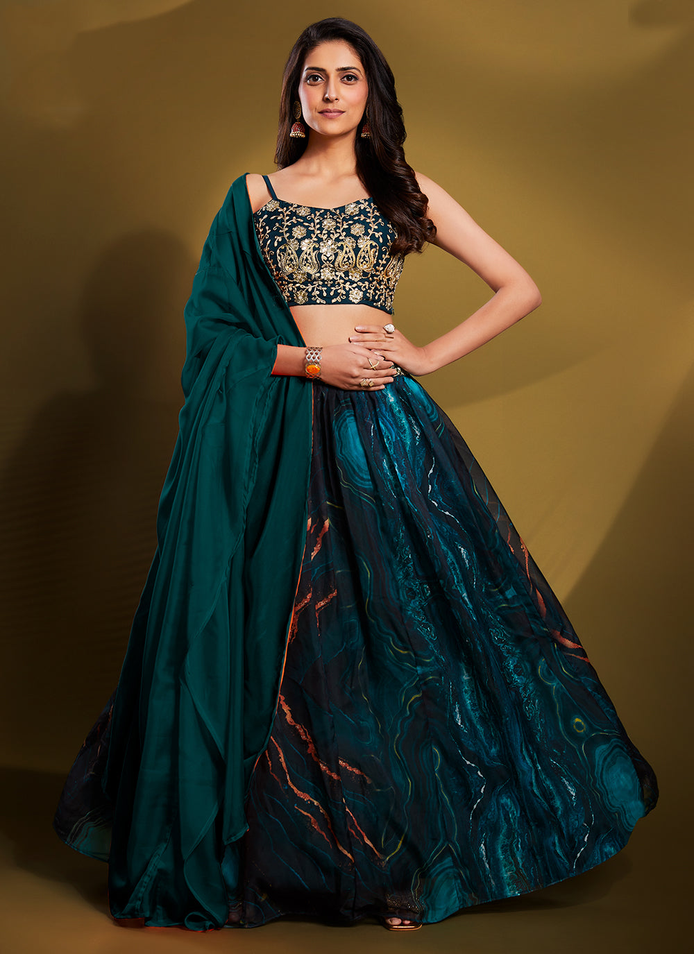 Teal Sequins Zari Embroidered Crepe Lehenga Choli