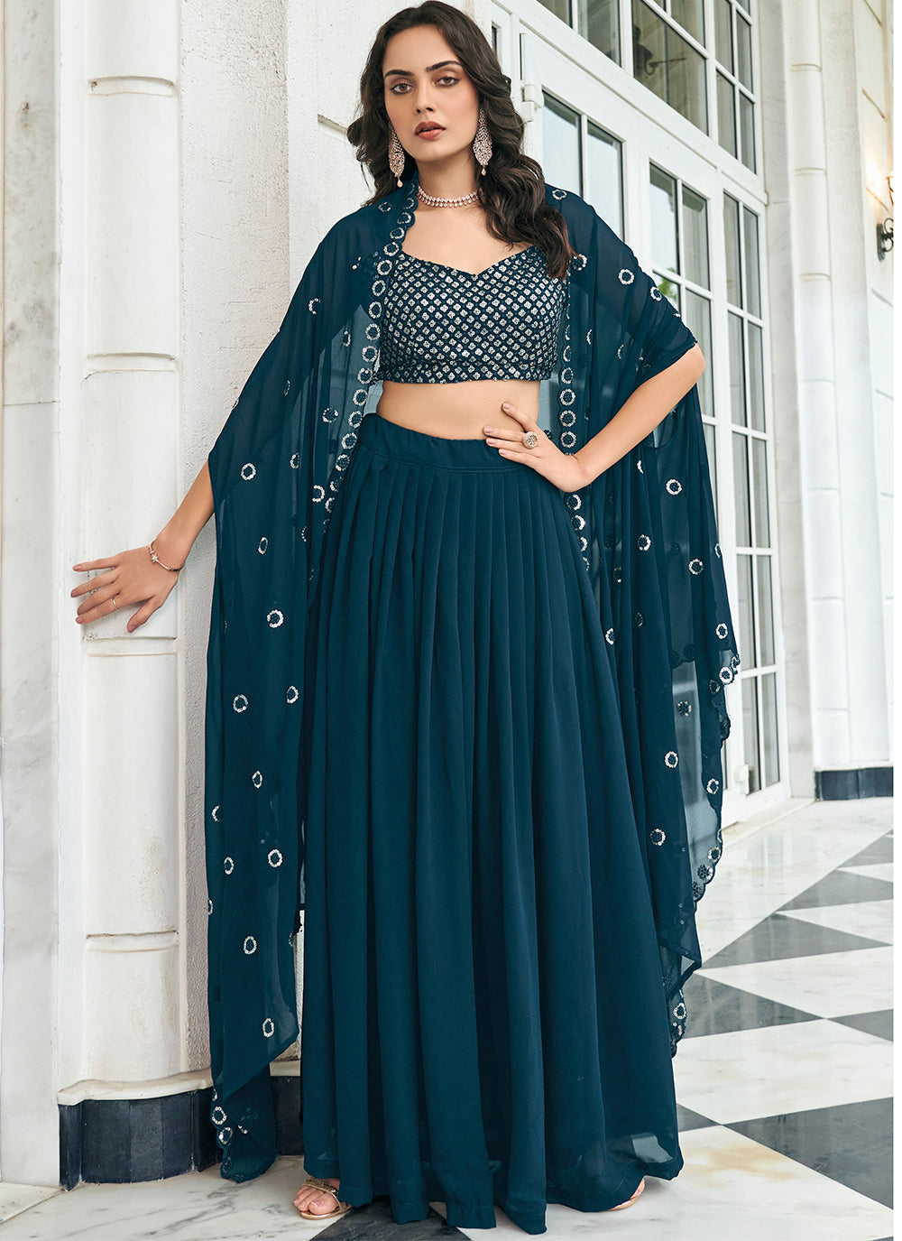 Teal Sequins Embroidered Faux Georgette Lehenga Choli