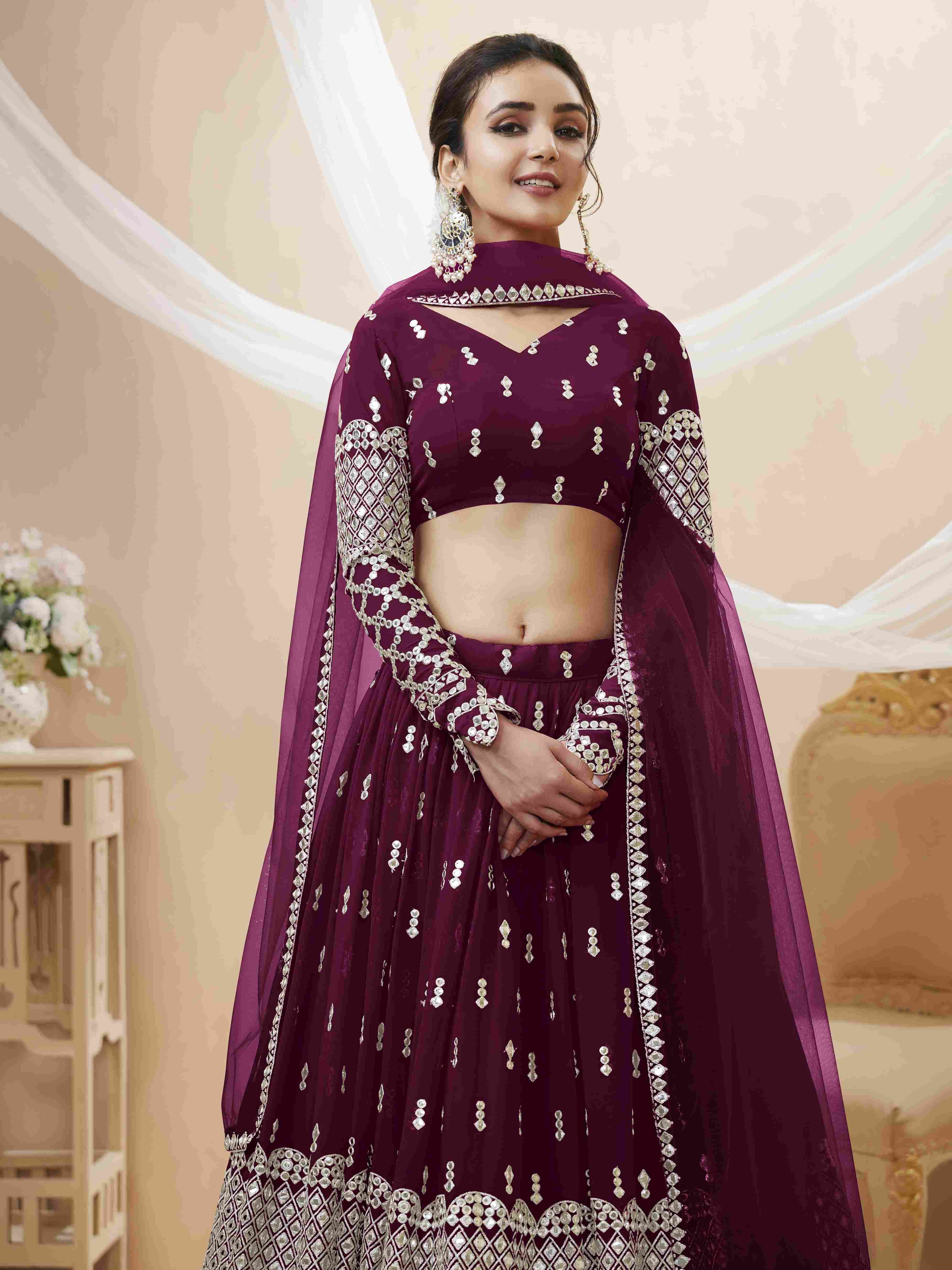 Wine Sequins Embroidered Net Lehenga Choli