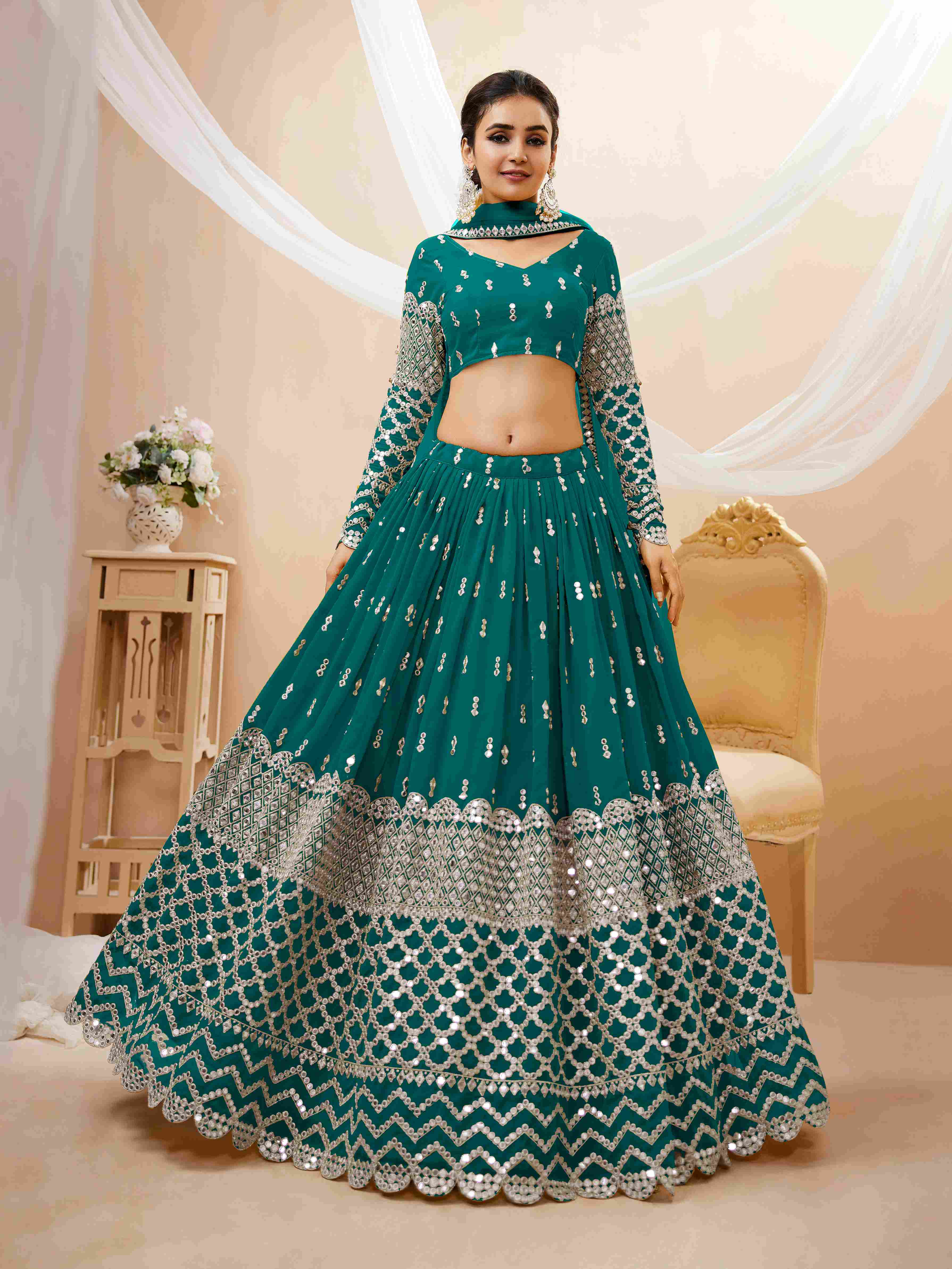 Teal Blue Sequins Embroidered Net Lehenga Choli