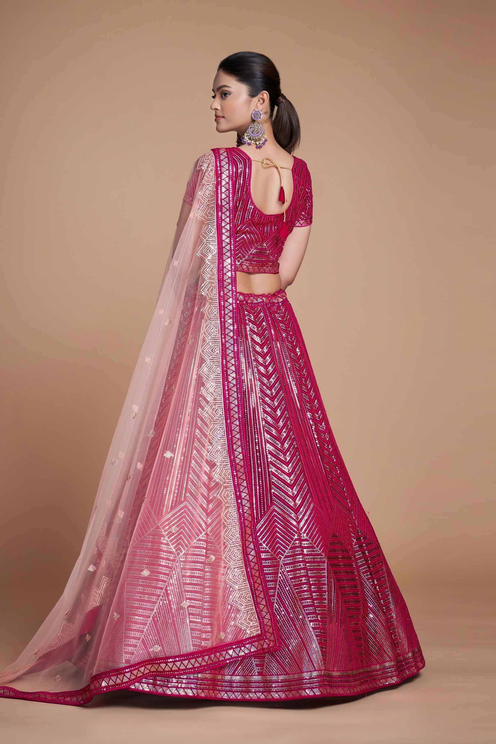 Magenta Pink Sequins Embroidered Net Lehenga Choli