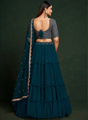 Teal Blue Sequins Embroidered Net Lehenga Choli