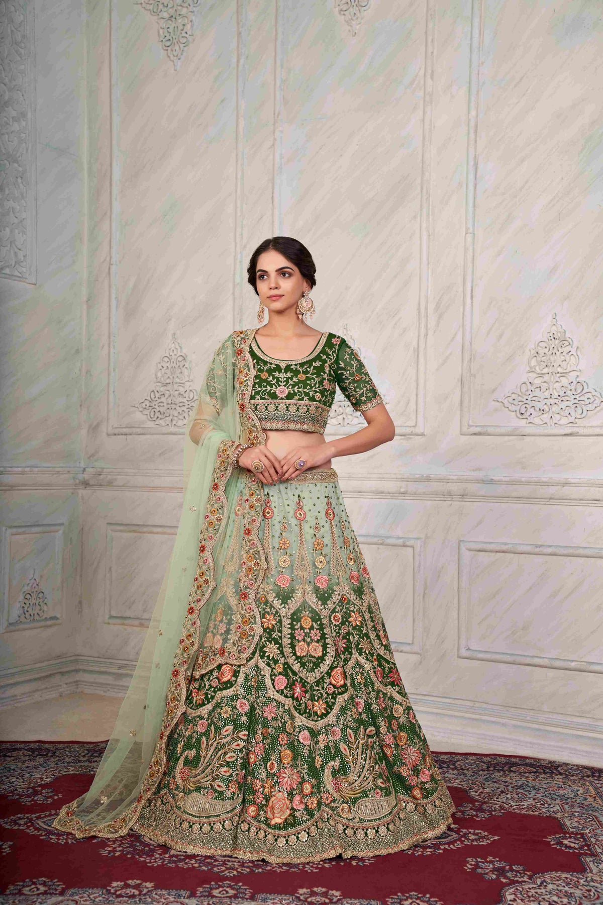 Pista Thread Embroidered Net Lehenga Choli