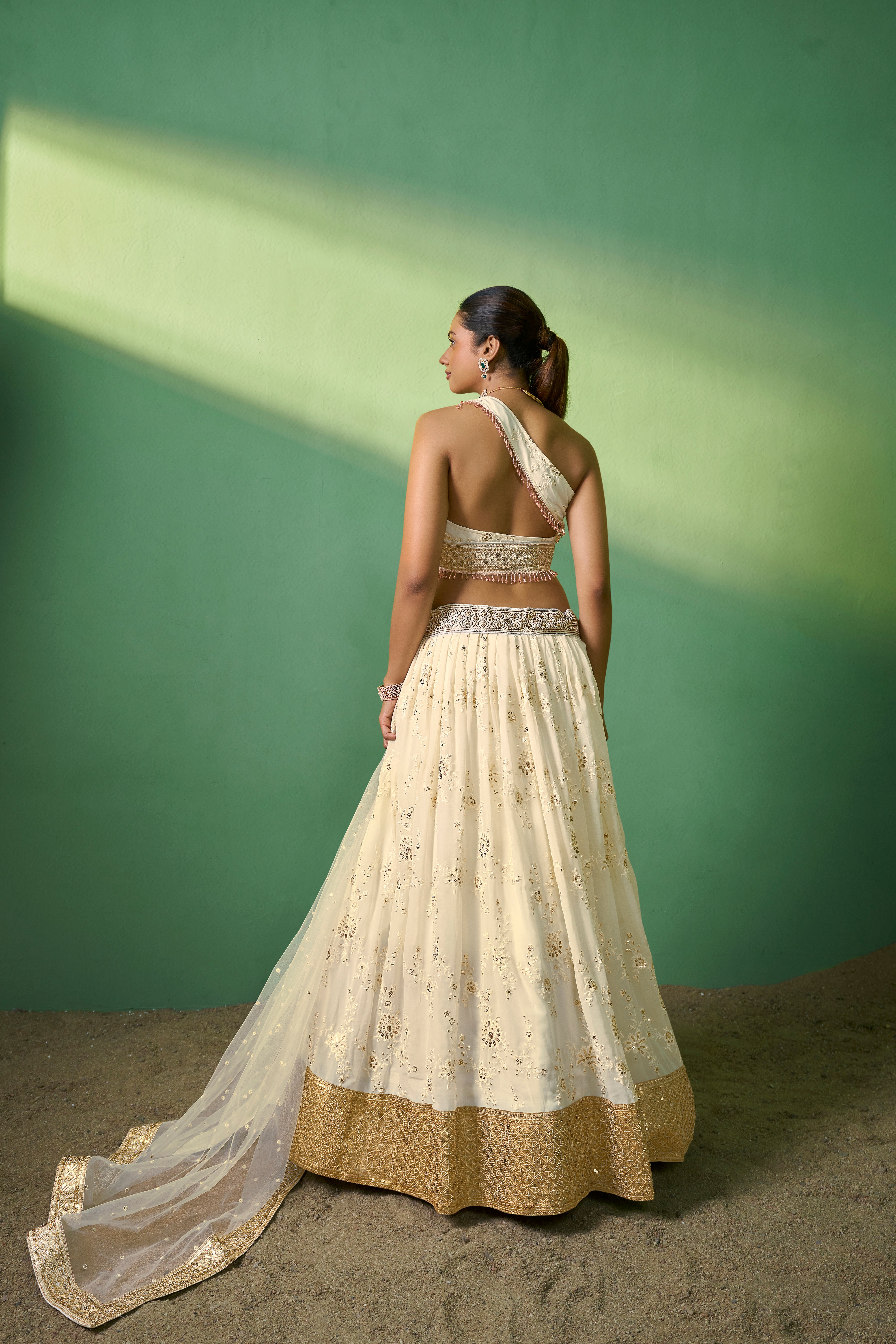 Cream Georgette Sequins Embroidered Lehenga Choli