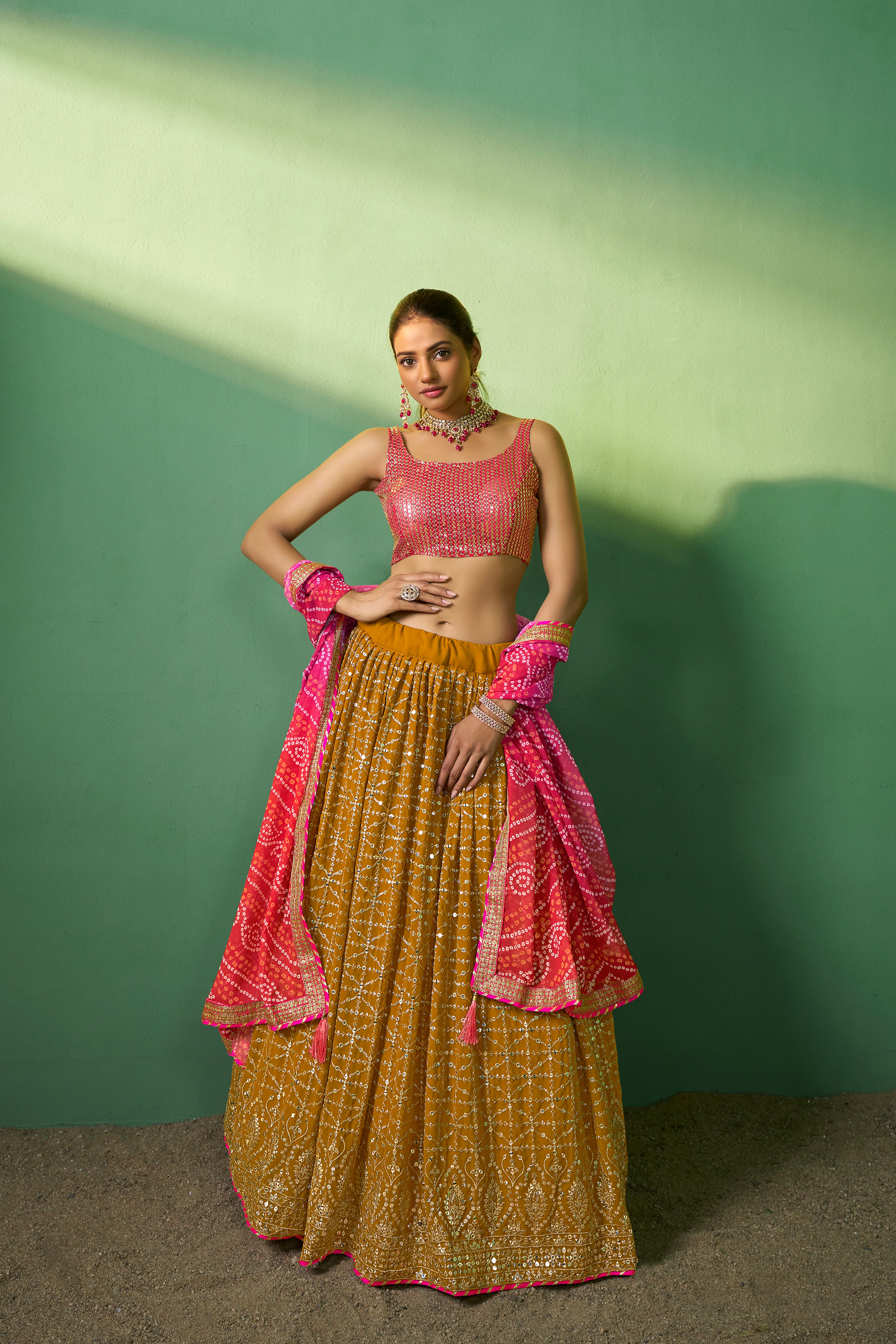 Mustard Georgette Sequins Embroidered Lehenga Choli