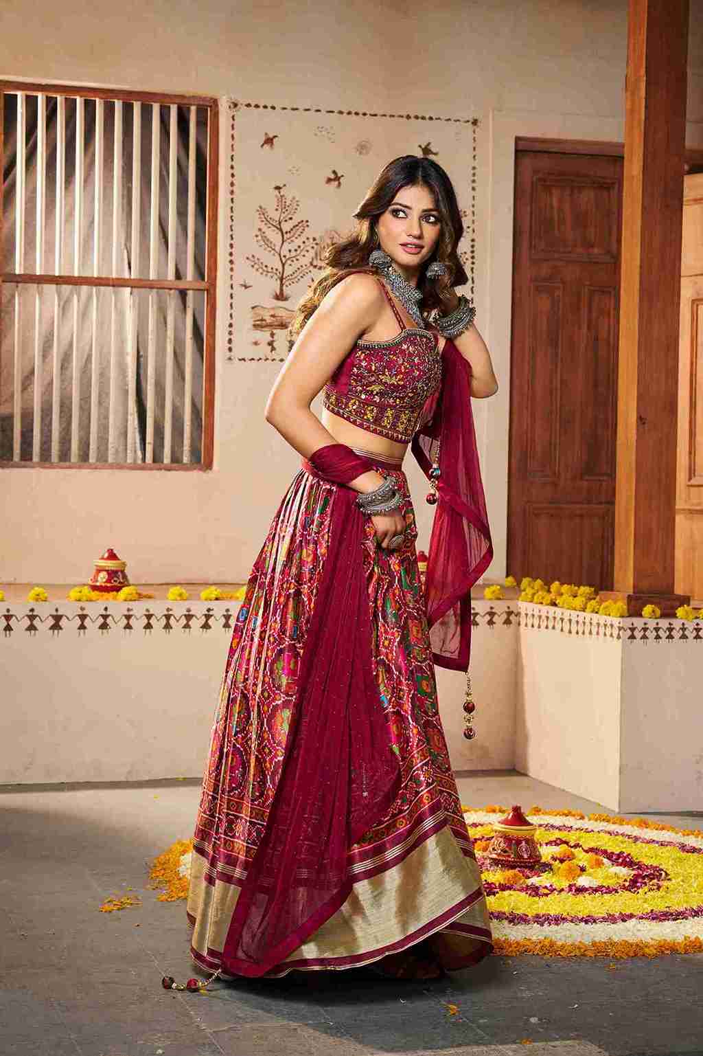 Maroon Colored Silk Thread Embroidered Navratri Lehenga Choli For Women