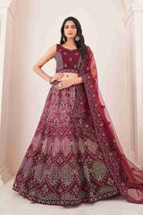 Burgundy Colored Soft Net Sequins Embroidered  Lehenga Choli For Women