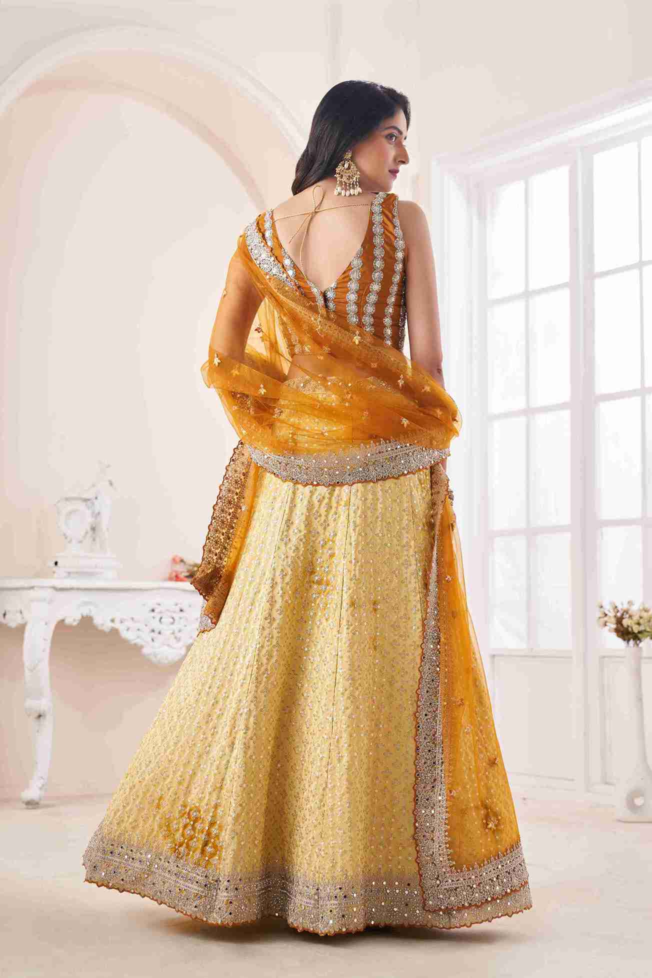 Yellow Georgette Sequins Embroidered Lehenga Choli