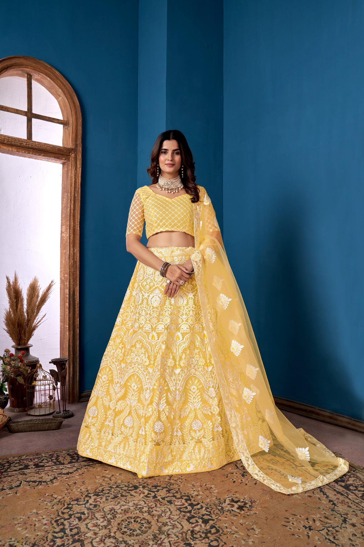 Yellow Net Sequins Embroidered Lehenga Choli