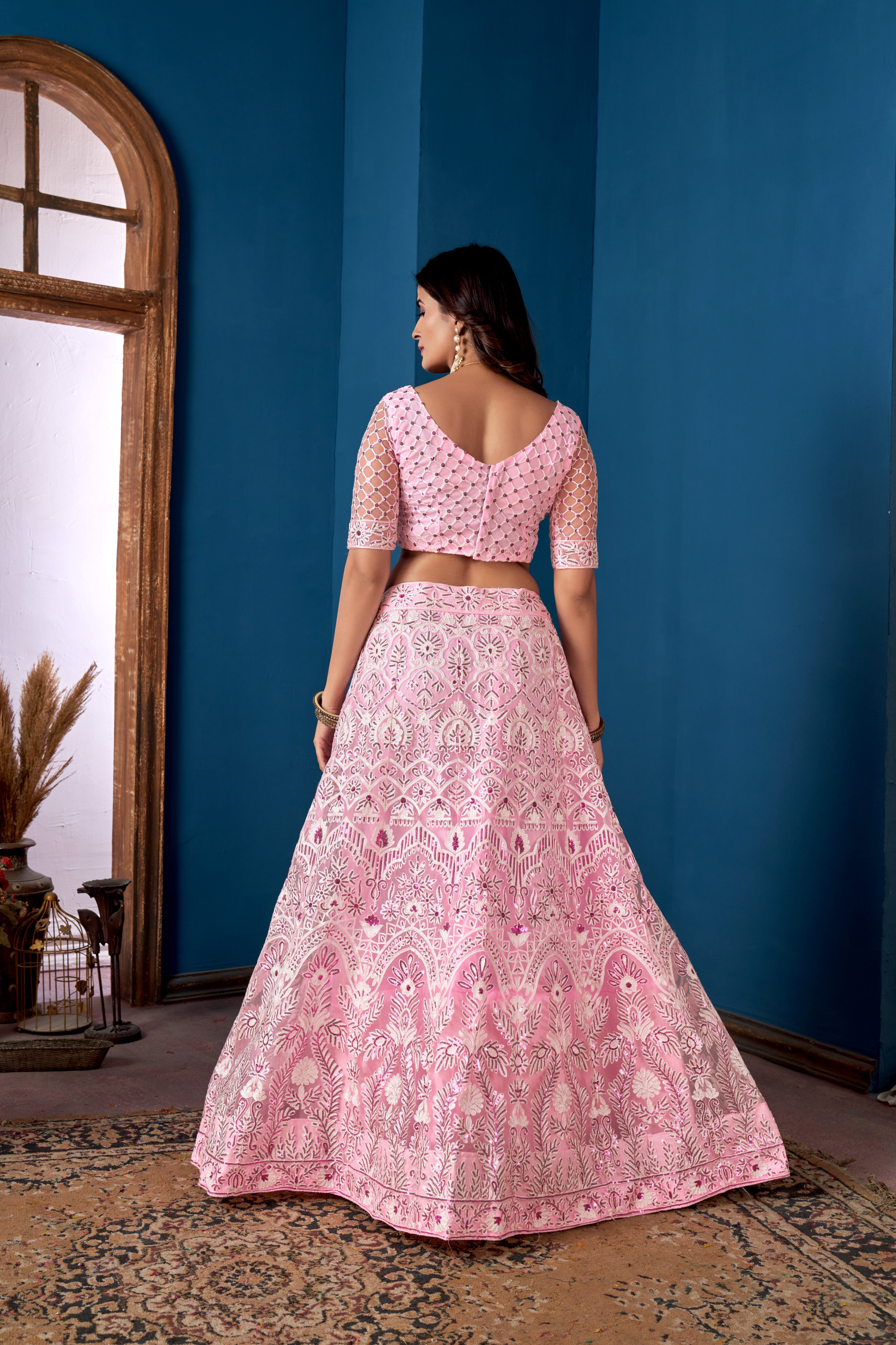 Pink Net Sequins Embroidered Lehenga Choli