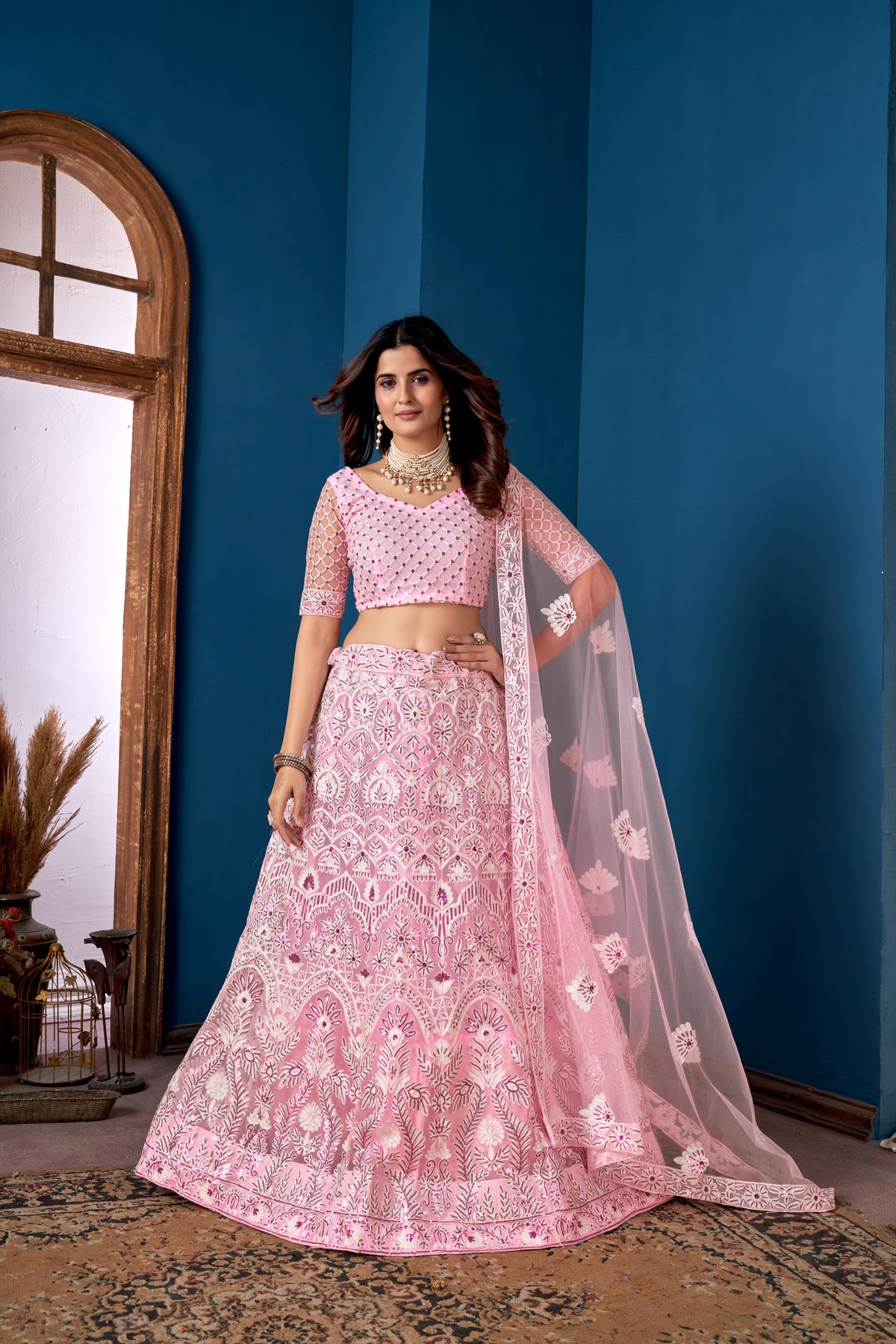 Pink Net Sequins Embroidered Lehenga Choli