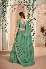 Green Faux Georgette Sequins Embroidered Lehenga Choli