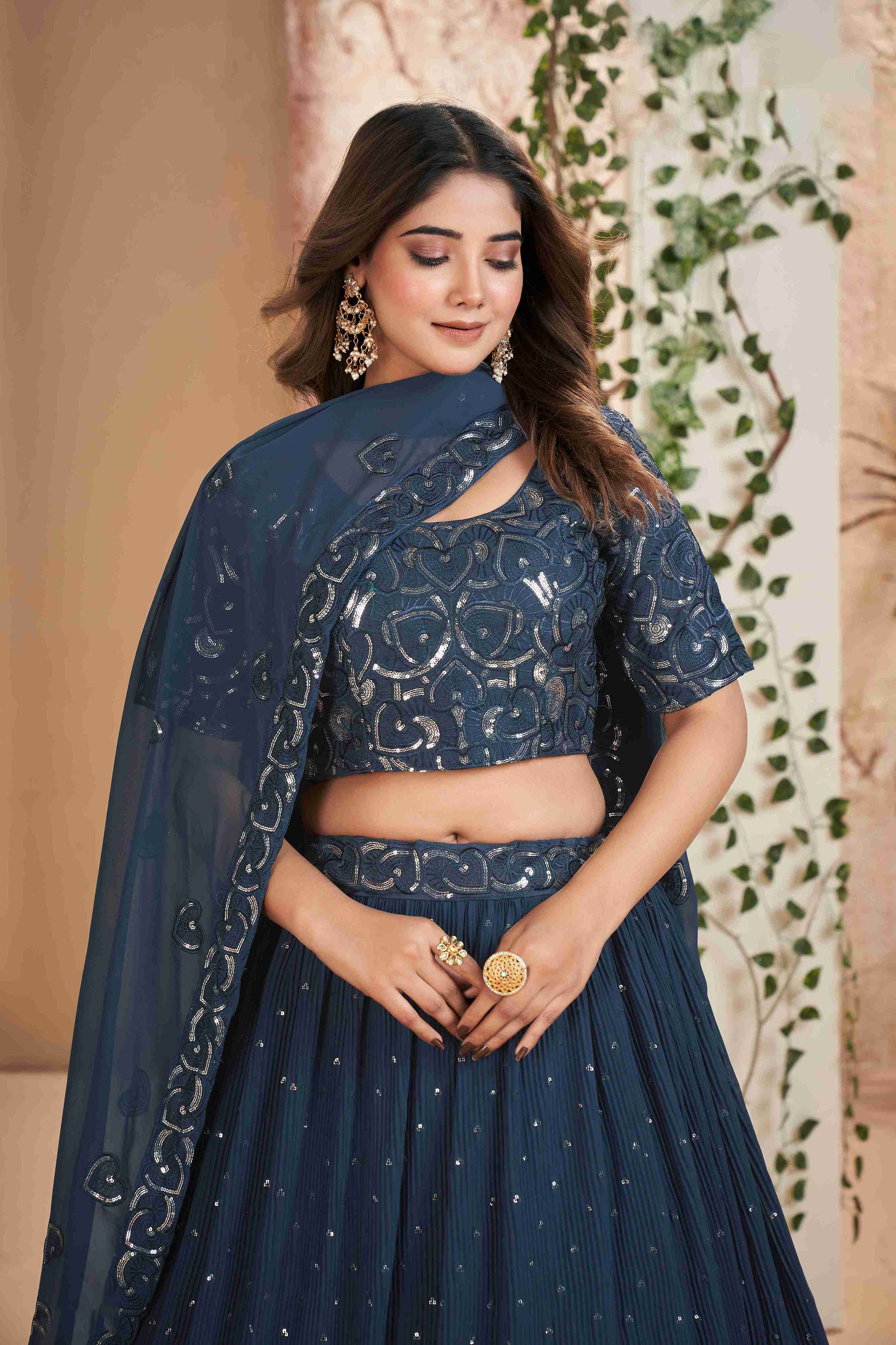 Blue Faux Georgette Sequins Embroidered Lehenga Choli