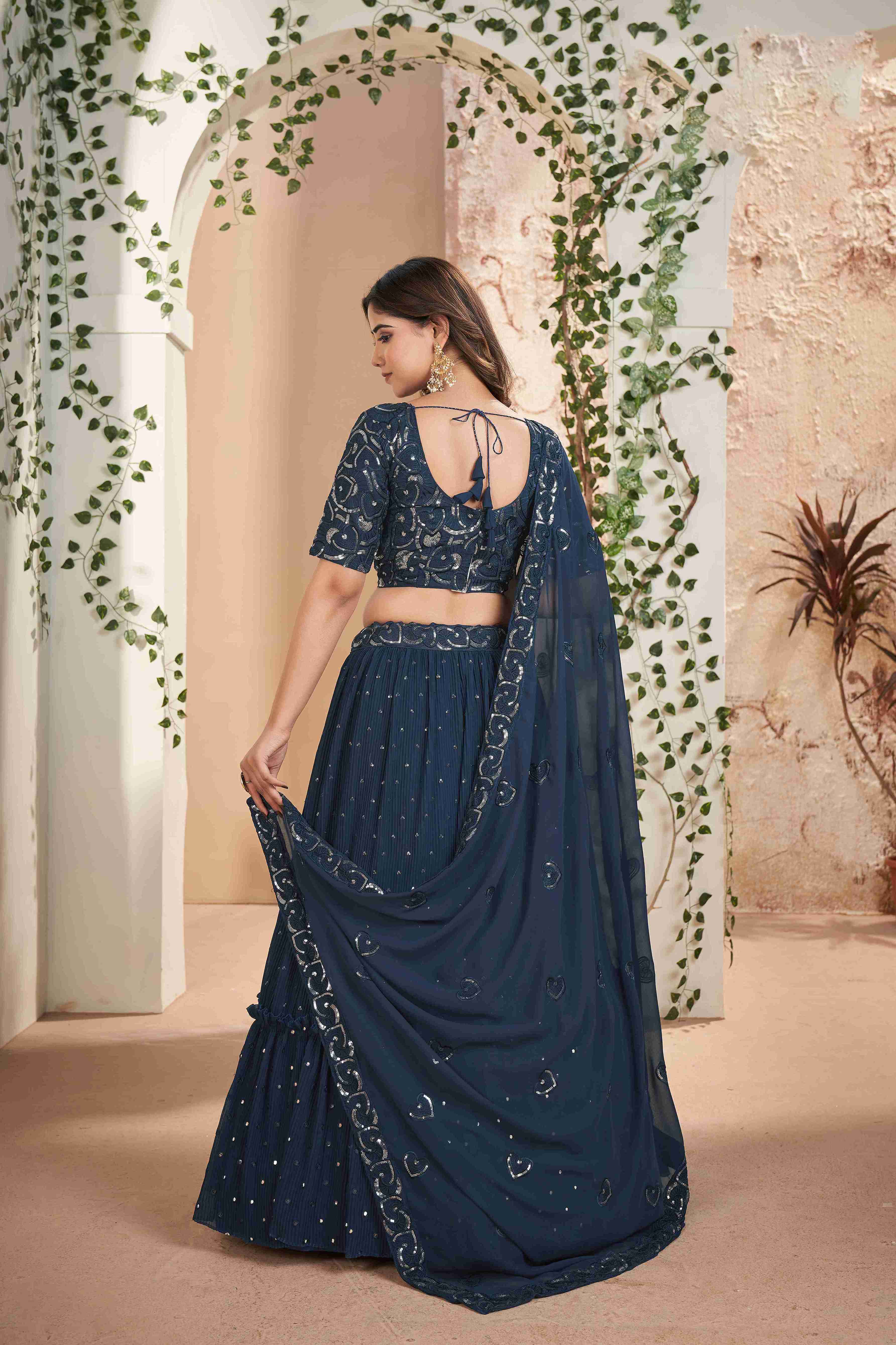 Blue Faux Georgette Sequins Embroidered Lehenga Choli