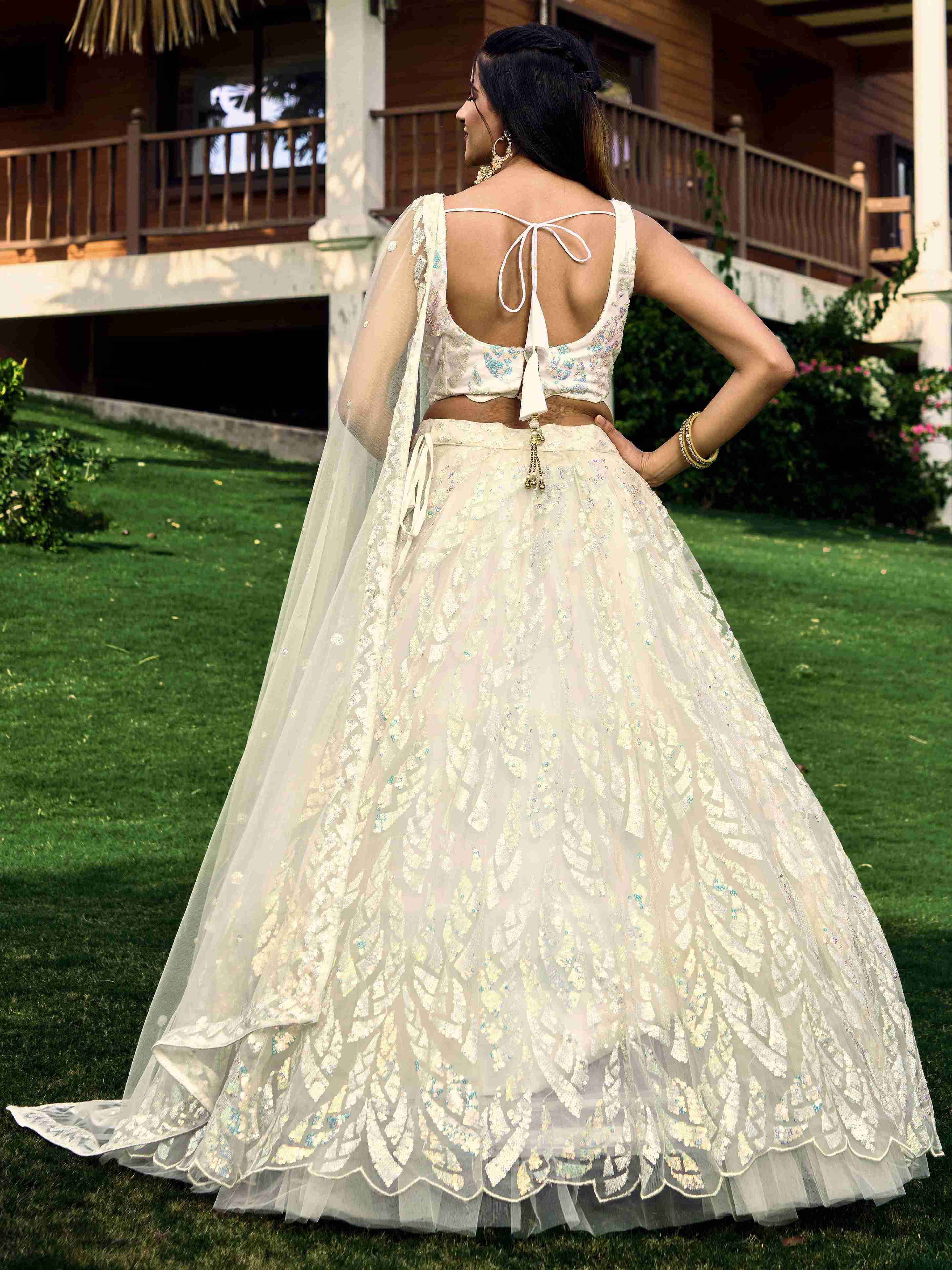 White Soft Net Sequins Embroidered Lehenga Choli