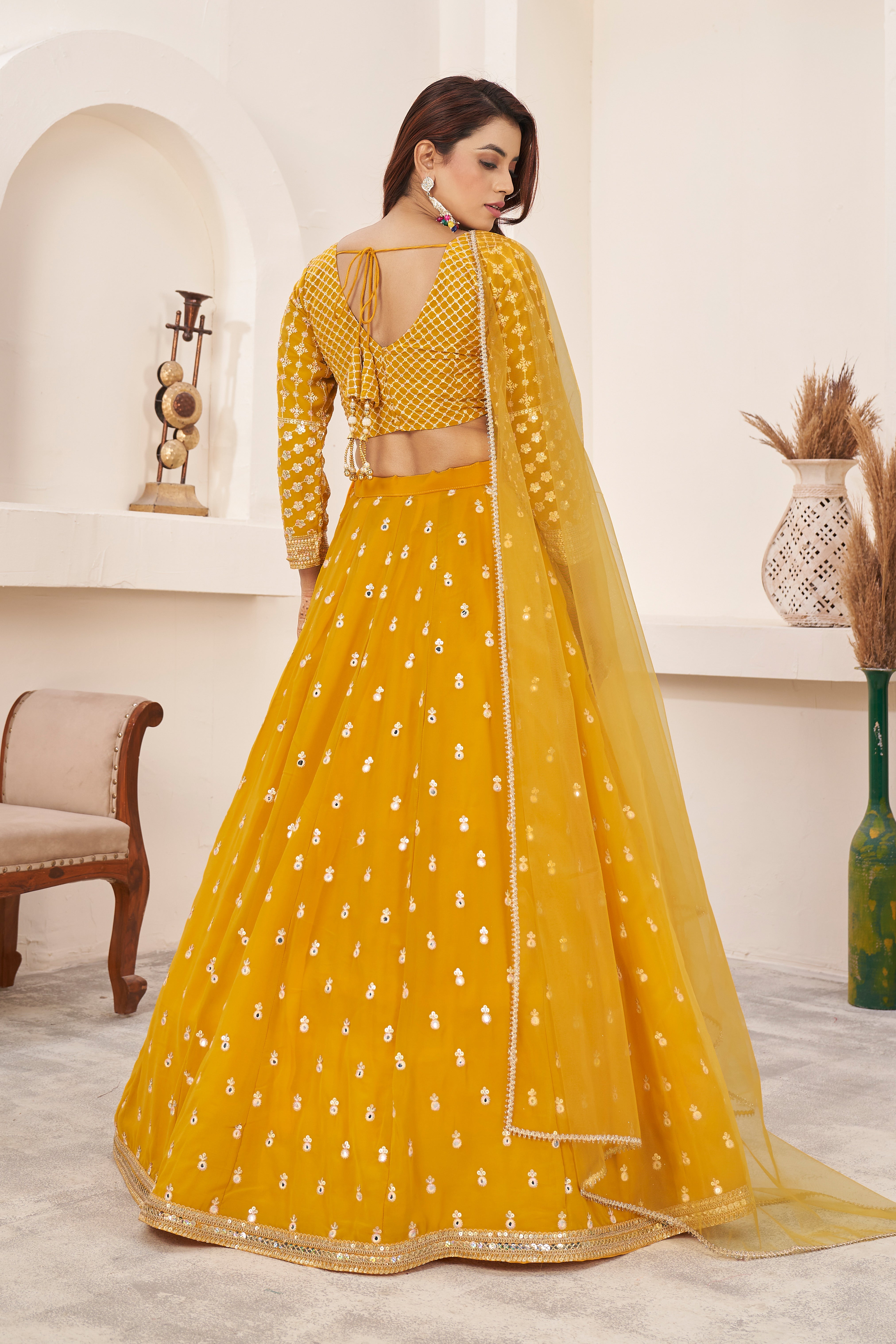 Yellow Georgette Sequins Embroidered Lehenga Choli