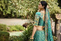 Sea Green Crepe Georgette Woven Embroidered Lehenga Choli