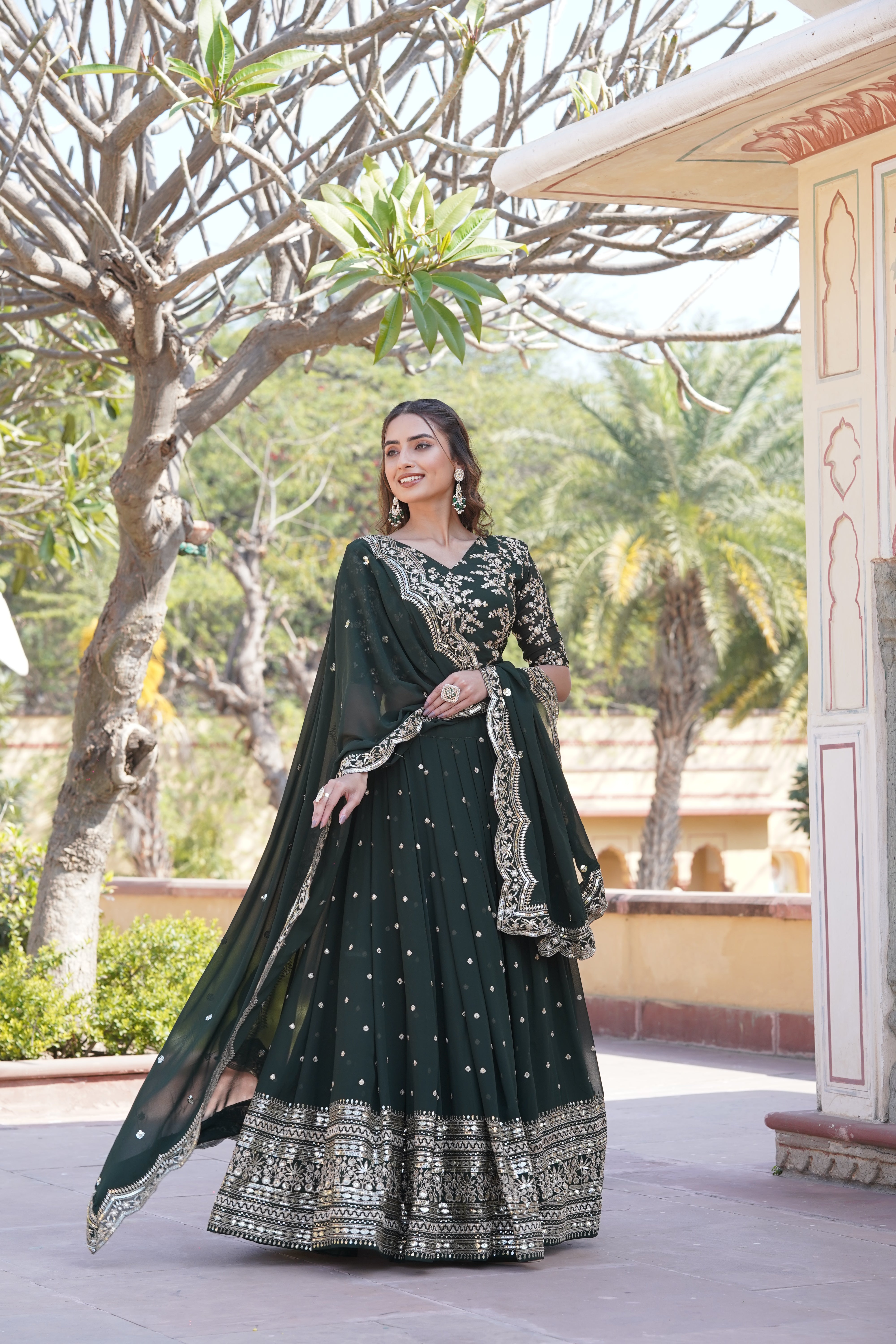 Green Faux Georgette Sequins Embroidered Lehenga Choli